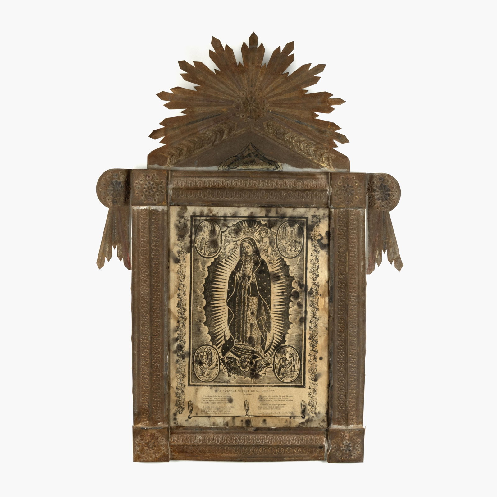 Mexican, Virgen de Guadalupe Print in Stamped Tin Frame, ca. 19th Century: Mexican Virgen de Guadalupe Print in Stamped Tin Frame, ca. 19th Century stamped tin, European print 15 3/8 x 11 1/4 in. (39.1 x 28.6 cm.), frame: 30 x 21 1/8 x 1 3/4 in. (76.2 x 53.7 x 4.4 cm.) Priva
