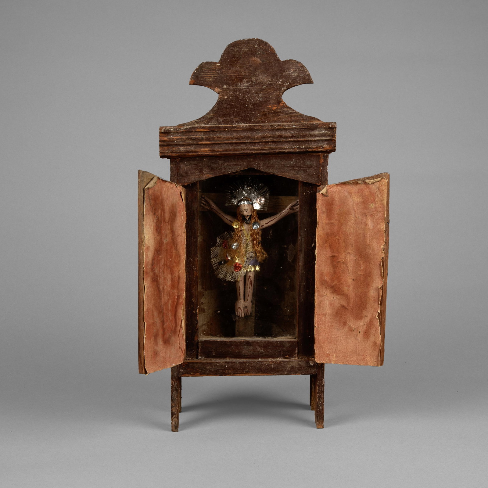 Mexican, Crucifixión Nicho, ca. 19th Century: Mexican Crucifixión Nicho, ca. 19th Century carved and painted wood, glass, mixed media Folk Art 15 3/4 x 6 7/8 x 4 1/8 in. (40 x 17.5 x 10.5 cm.) Private Collection, Texas