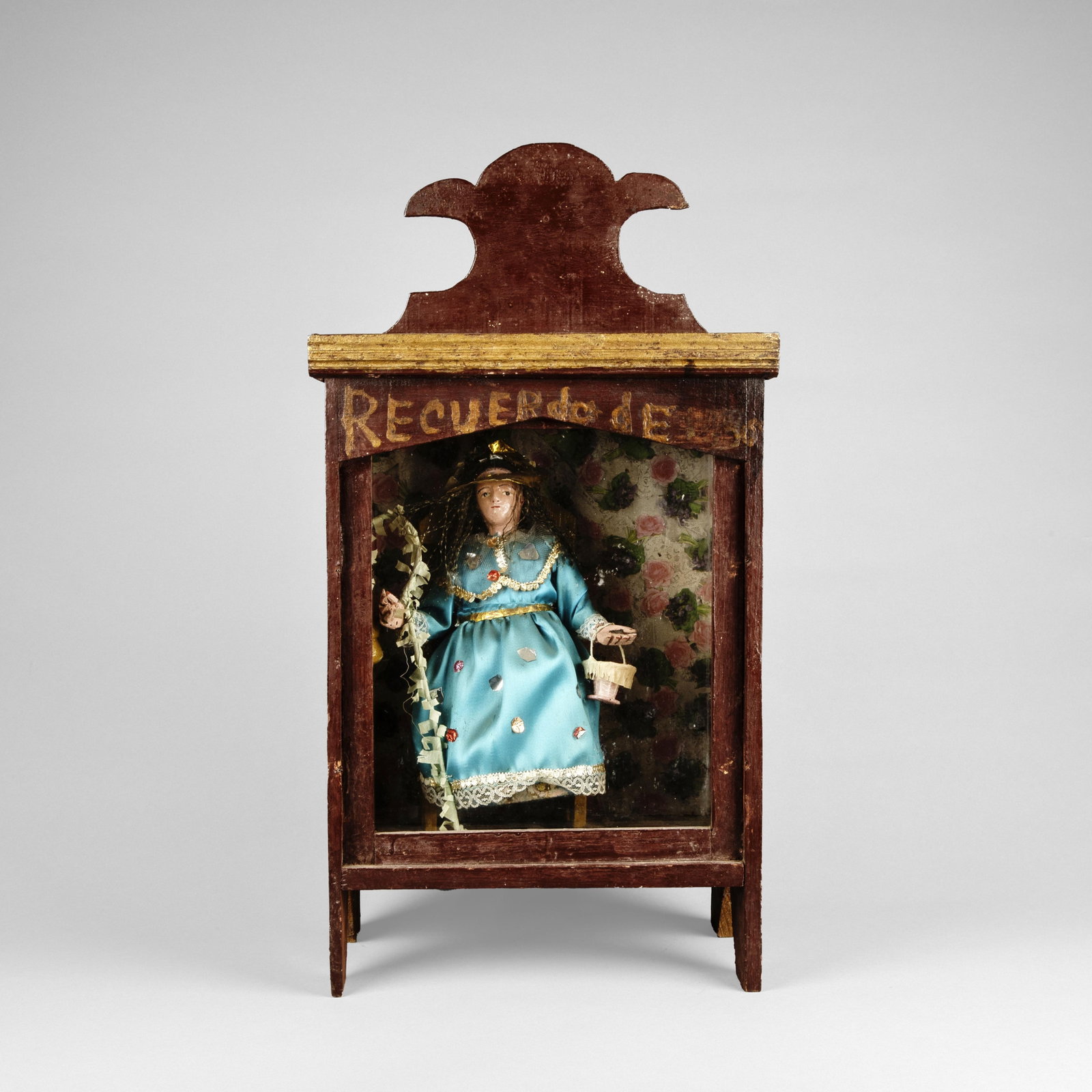 Mexican, Nicho, ca. 19th Century: Mexican Nicho, ca. 19th Century carved and painted wood, glass, mixed media inscribed: ReCUERdo DE (in memory of) Folk Art 23 3/8 x 12 3/4 x 7 5/8 in. (59.4 x 32.4 x 19.4 cm.) Private Collection, Texa