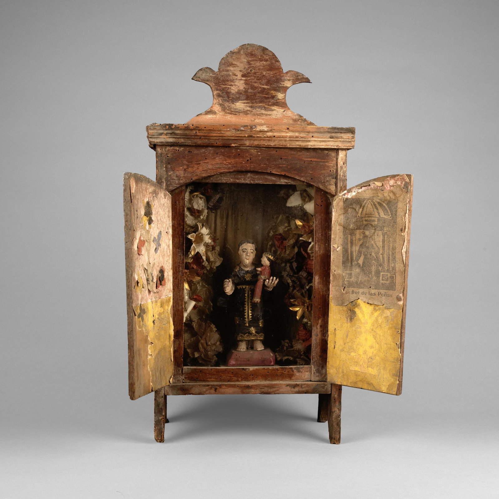 Mexican, Nicho, ca. 19th Century: Mexican Nicho, ca. 19th Century carved and painted wood, glass, mixed media Folk Art 22 3/4 x 11 3/8 x 6 1/4 in. (57.8 x 28.9 x 15.9 cm.) Private Collection, Texas