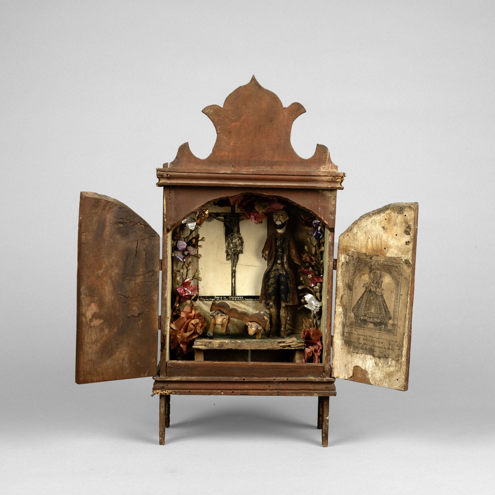 Mexican, Nicho, ca. 19th Century: Mexican Nicho, ca. 19th Century carved wood, mixed media Folk Art 17 1/4 x 8 1/2 x 4 1/2 in. (43.8 x 21.6 x 11.4 cm.) Private Collection, Texas