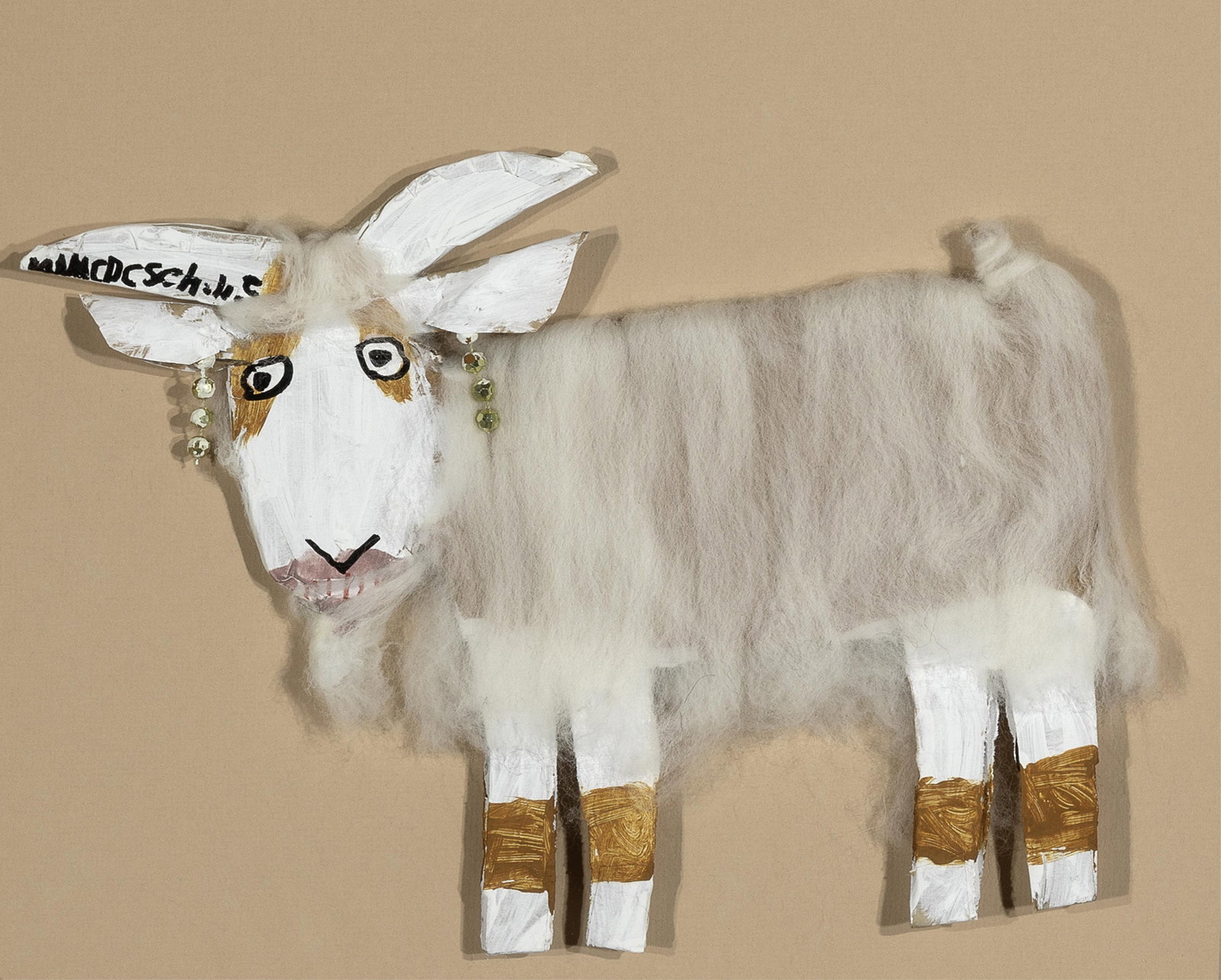 Mamie Deschillie, Goat: Mamie Deschillie Diné (Navajo), 1920 - 2010 Goat acrylic, wool, fabric, sequins on cardboard inscribed: MAMIDeSchillie Folk Art 10 3/8 x 14 in. (26.4 x 35.6 cm.), frame: 19 1/8 x 23 1/8 x 2 3/8 in.