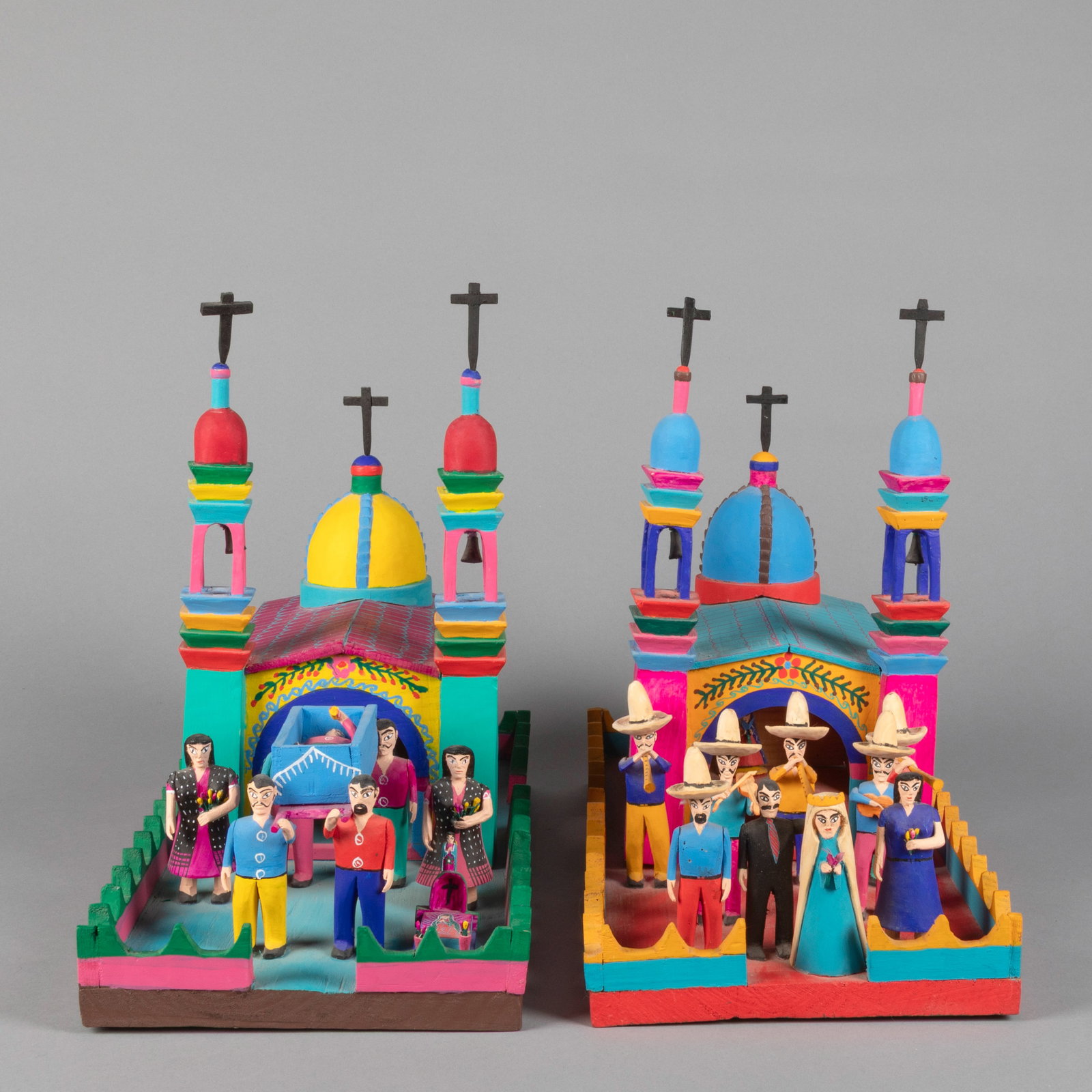 attributed to [Maximino Santiago Garcia], Two Cathedrals: attributed to [Maximino Santiago] [Garcia] Mexican, b. 1953 Two Cathedrals carved and painted wood Folk Art each: 13 1/4 x 8 1/4 x 16 5/8 in. (33.7 x 21 x 42.2 cm.) Private Collection, New Mexico