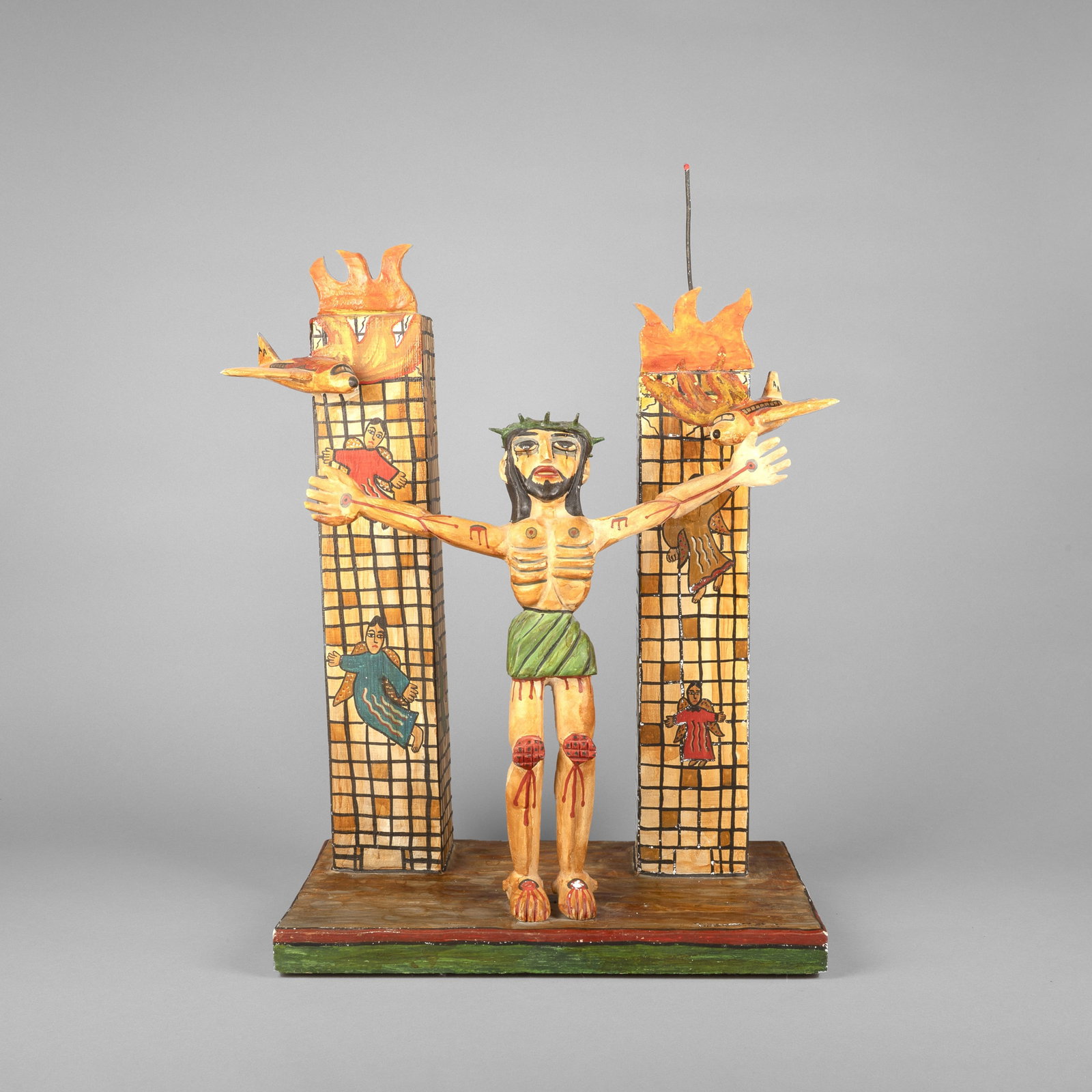Nicholas Herrera, In Memory of 9/11, 2002: Nicholas Herrera New Mexico, b. 1964 In Memory of 9/11, 2002 carved and painted wood inscribed: IN MEMORY OF 9/11 / NichoLAS HERRERA 02 Folk Art 25 x 17 x 11 in. (63.5 x 43.2 x 27.9 cm.) Private