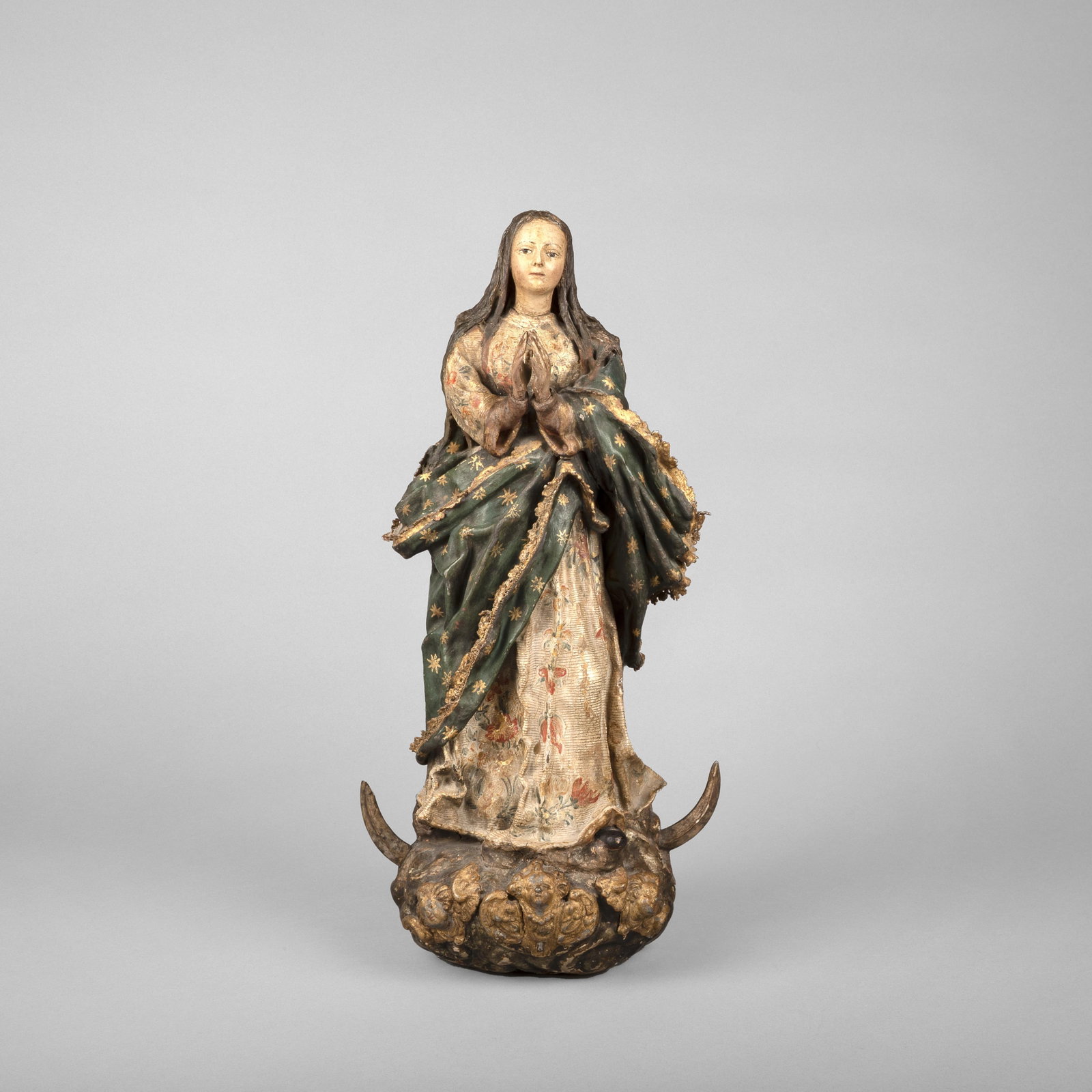 Spanish Colonial, Virgin Mary in Prayer, 19th Century: Spanish Colonial Virgin Mary in Prayer, 19th Century carved and painted wood Folk Art 16 3/4 x 8 x 5 7/8 in. (42.5 x 20.3 x 14.9 cm.) Private Collection, Colorado