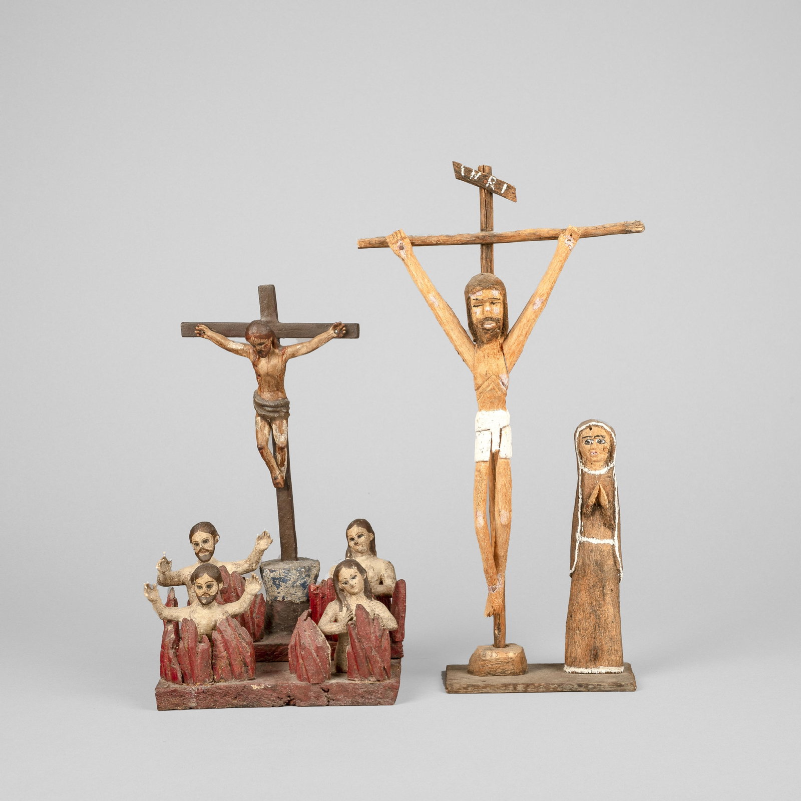 Unknown Santero, Two Crucifixes: Unknown Santero Two Crucifixes carved and painted wood Folk Art shorter: 12 x 7 3/8 x 5 1/4 in. (30.5 x 18.7 x 13.3 cm.), taller: 15 1/4 x 8 1/4 x 3 3/8 in. (38.7 x 21 x 8.6 cm.) Private Collection,