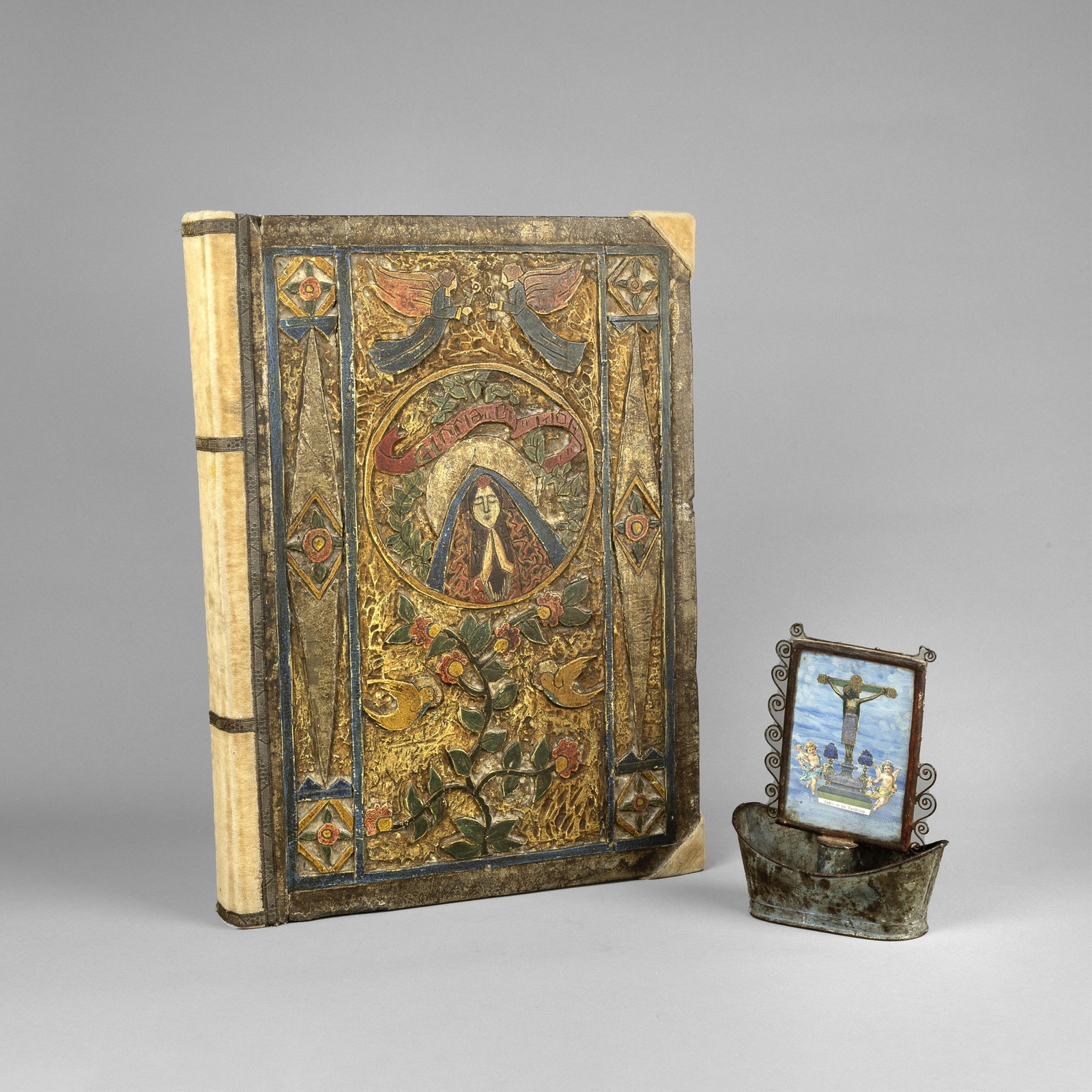 New Mexico, Two Devotional Works, ca. early 20th Century: Holy Water Vessel + Church File Book: New Mexico Two Devotional Works, ca. early 20th Century: Holy Water Vessel + Church File Book tin, glass, wood, velvet, paper, pigments Holy Water Vessel inscribed: Señor de los Temblores 8 x 6 1/4