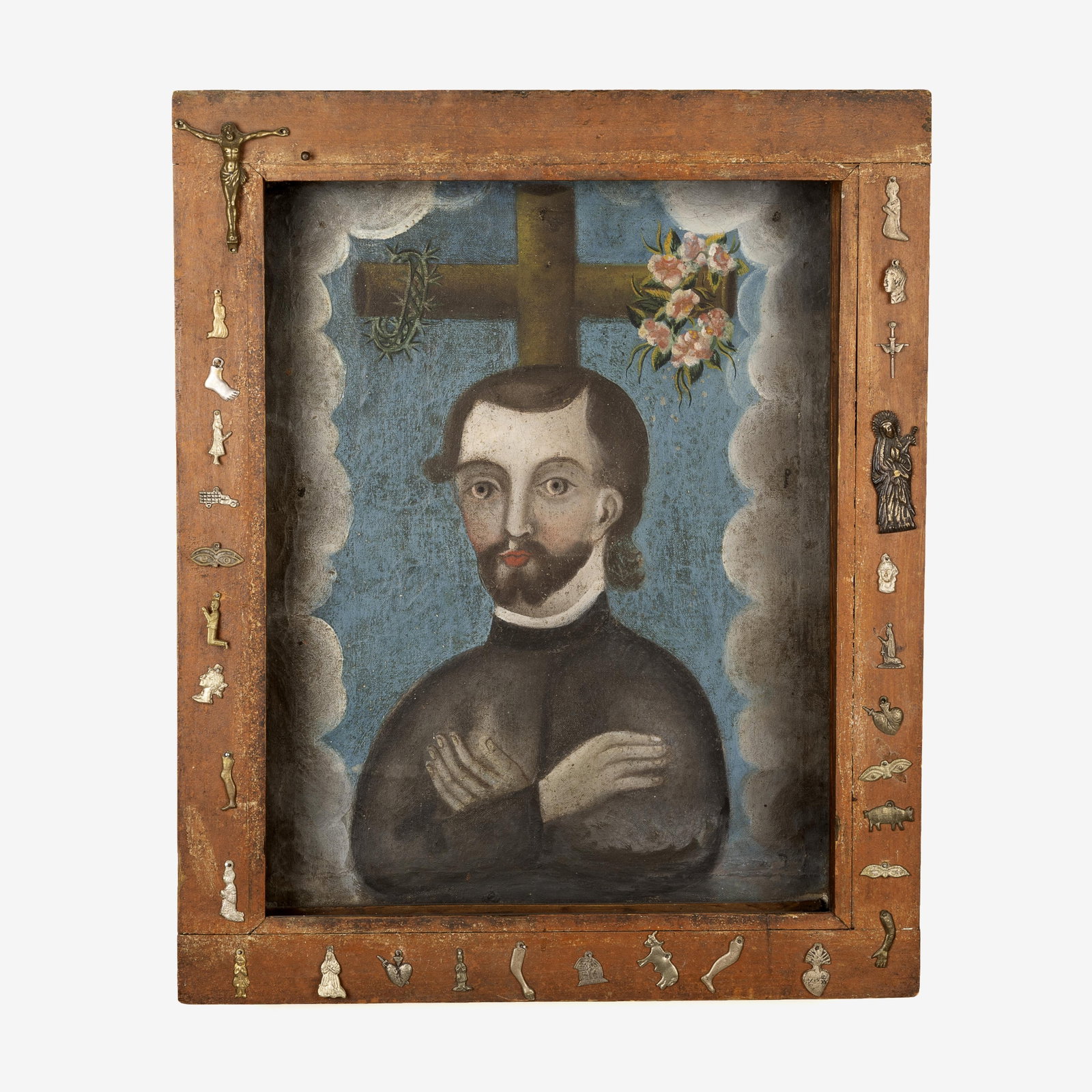 Guatemalan, Saint with Cross, ca. 19th Century: Guatemalan Saint with Cross, ca. 19th Century oil on panel with frame featuring milagros Folk Art 16 x 12 in. (40.6 x 30.5 cm.), frame: 19 5/8 x 16 x 2 7/8 in. (49.8 x 40.6 x 7.3 cm.) Private Collecti