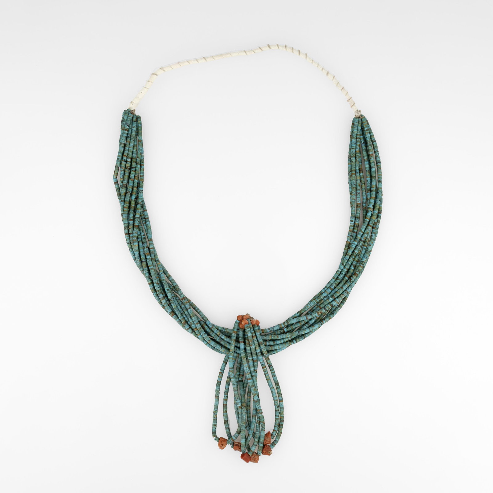 Diné (Navajo), Ten-Strand Turquoise Necklace with Turquoise and Coral Jaclas, ca. 1980: Diné (Navajo) Ten-Strand Turquoise Necklace with Turquoise and Coral Jaclas, ca. 1980 turquoise, coral, leather hanging length: 17 in. (43.2 cm.), jaclas: 4 3/4 in. (12.1 cm.) Private Collection, Tex