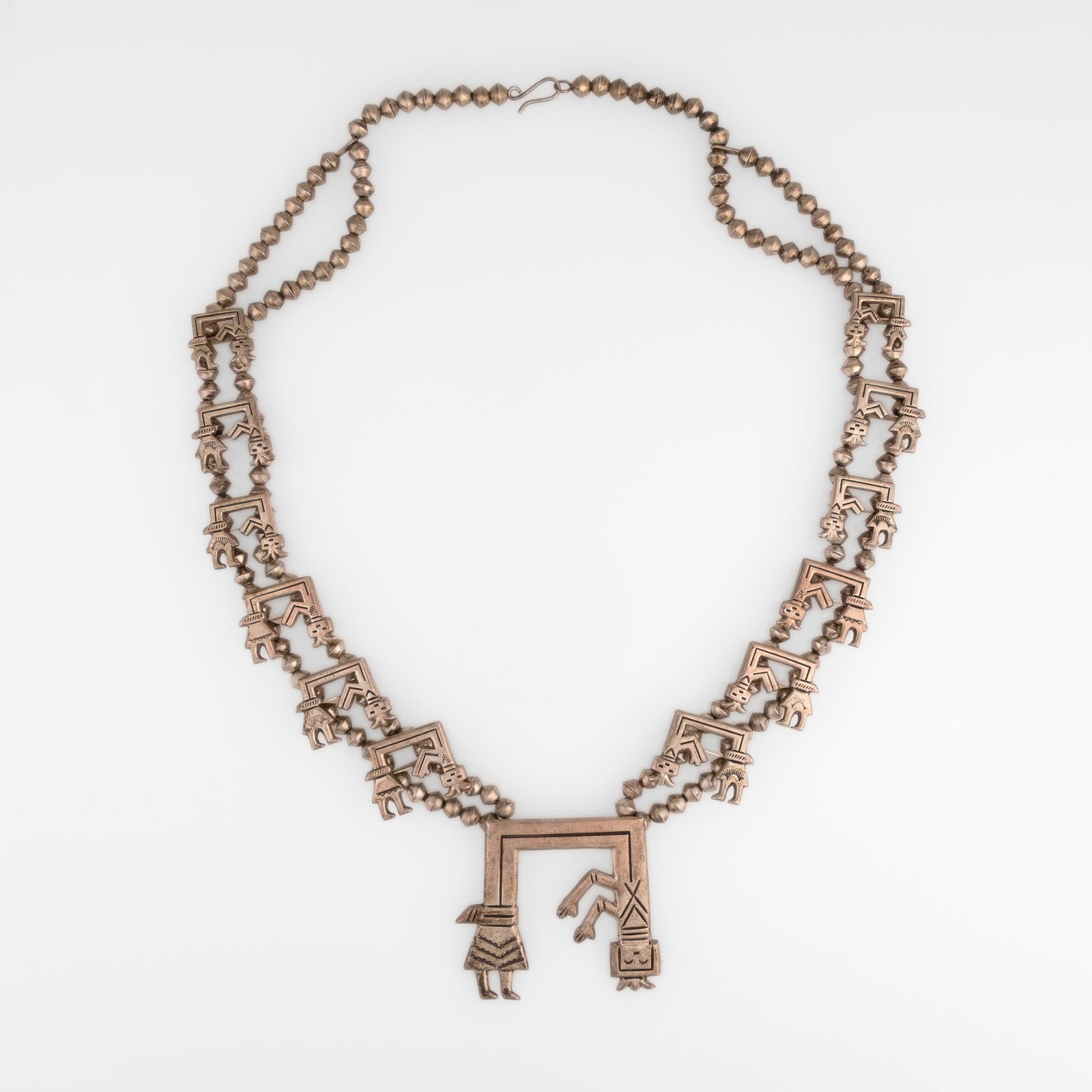 Diné (Navajo), Silver Yei Squash Blossom Necklace, ca. 1960 - 1970