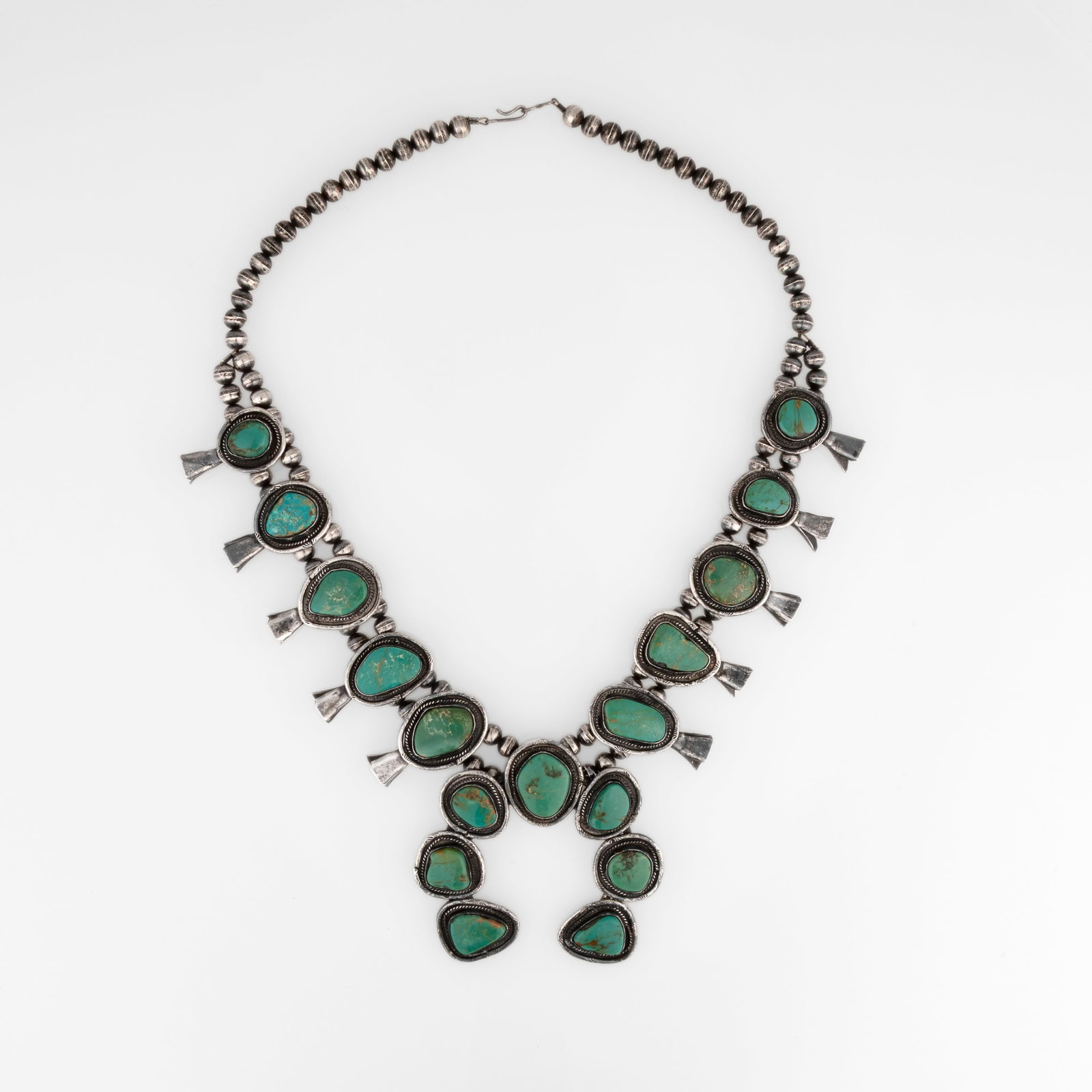 attributed Diné (Navajo), Silver and Turquoise Squash Blossom Necklace (1 of 2)