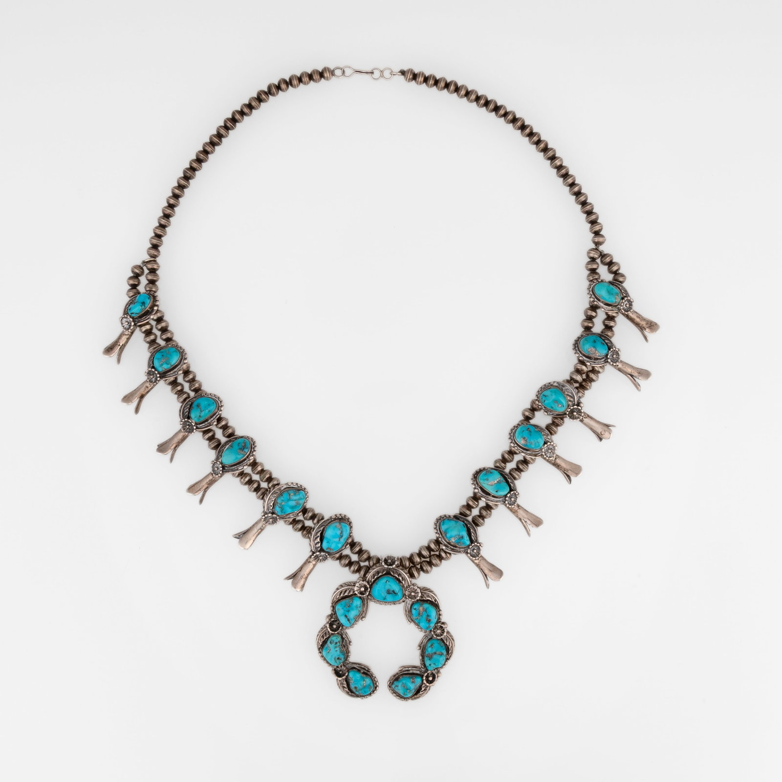 Diné (Navajo), Sterling Silver Child's Squash Blossom Necklace, ca. 1970 (1 of 2)
