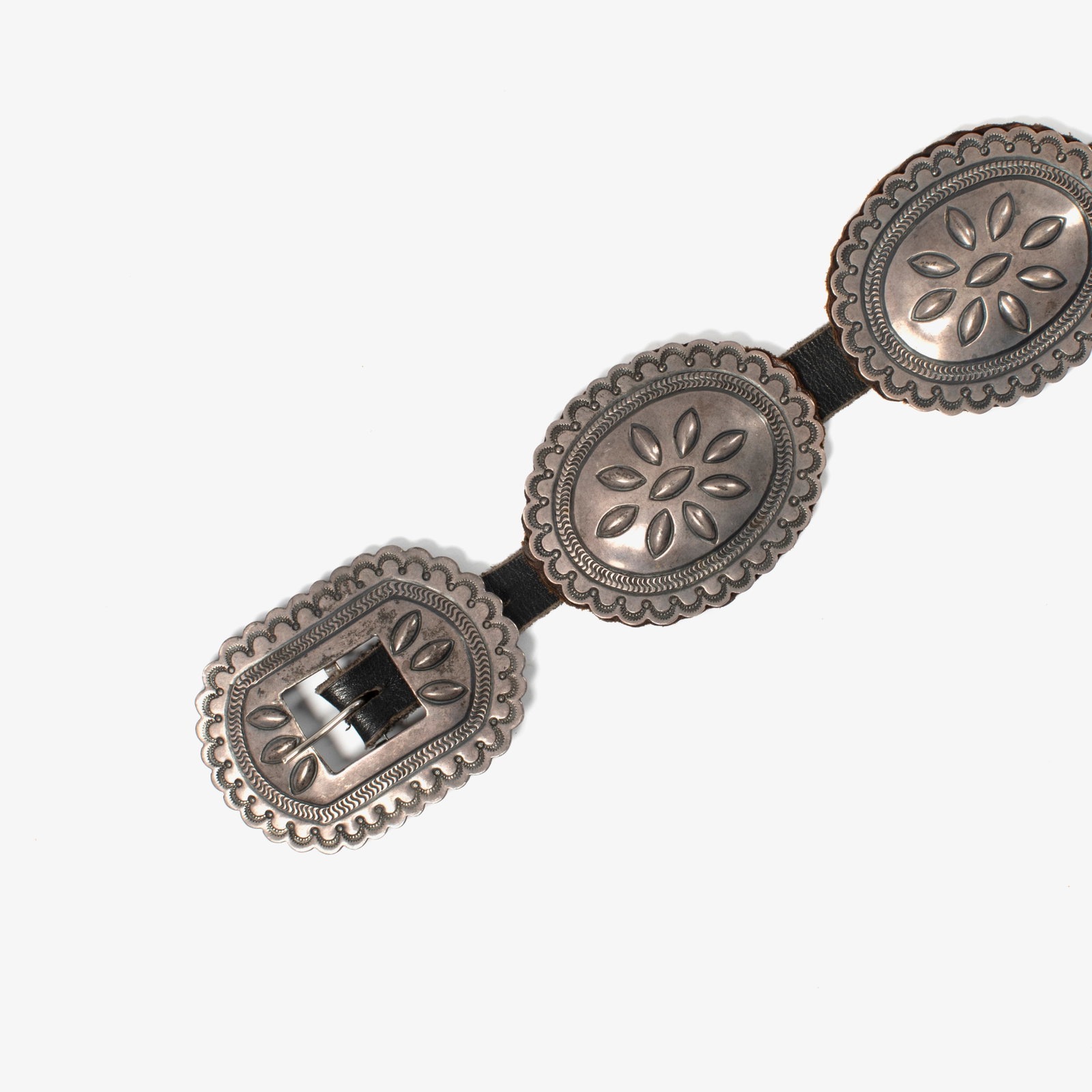 attributed to [Roger Skeet], Stamped Silver Concho Belt, ca. 1945 - 1955 (1 of 3)