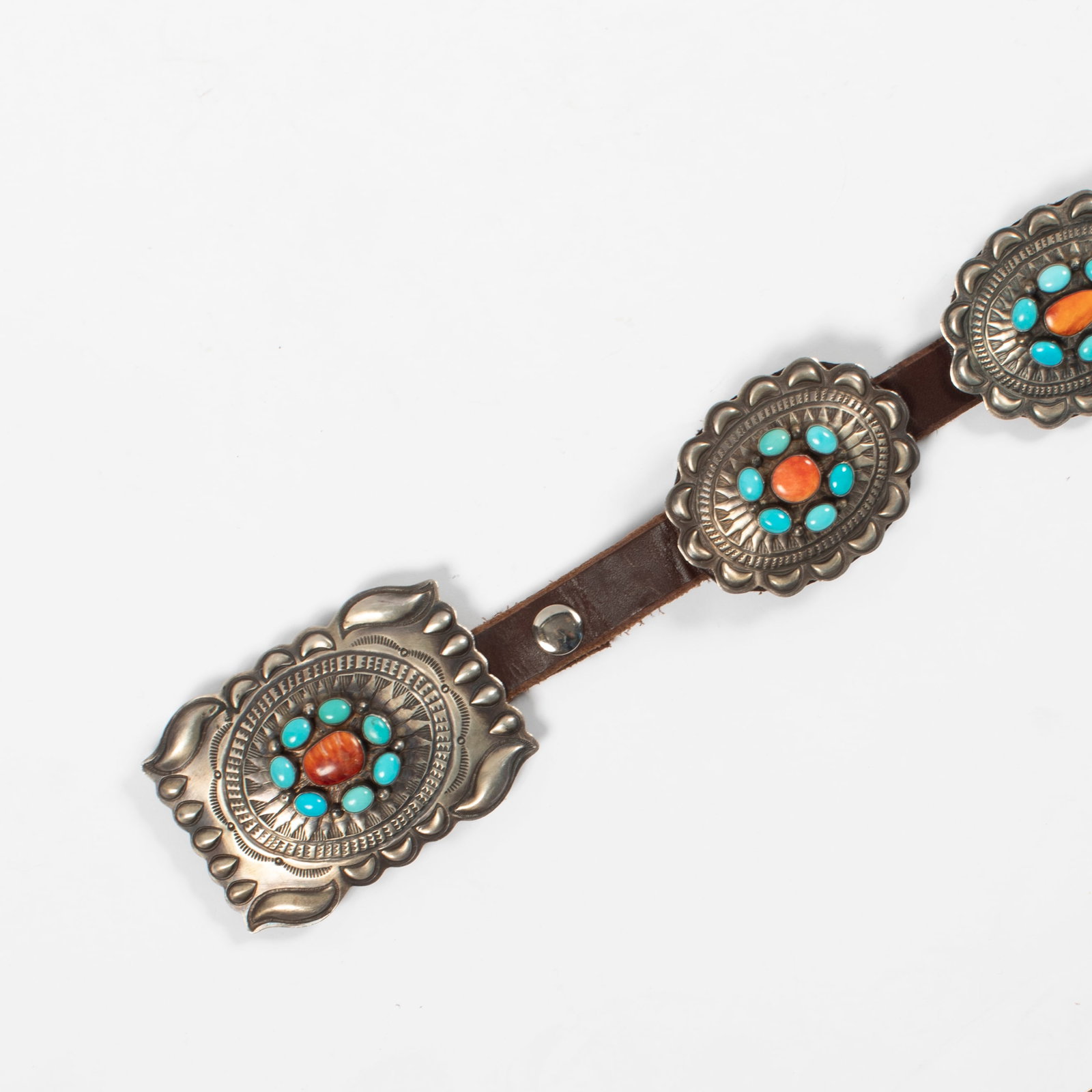 Dan Morgan, Turquoise and Spiny Oyster Cluster Concho Belt: Dan Morgan Diné (Navajo), 20th/21st Century Turquoise and Spiny Oyster Cluster Concho Belt sterling silver, turquoise, spiny oyster stamped: D M / Sterling gross weight: 417 g. belt: 44 3/4 x 3/4 in.