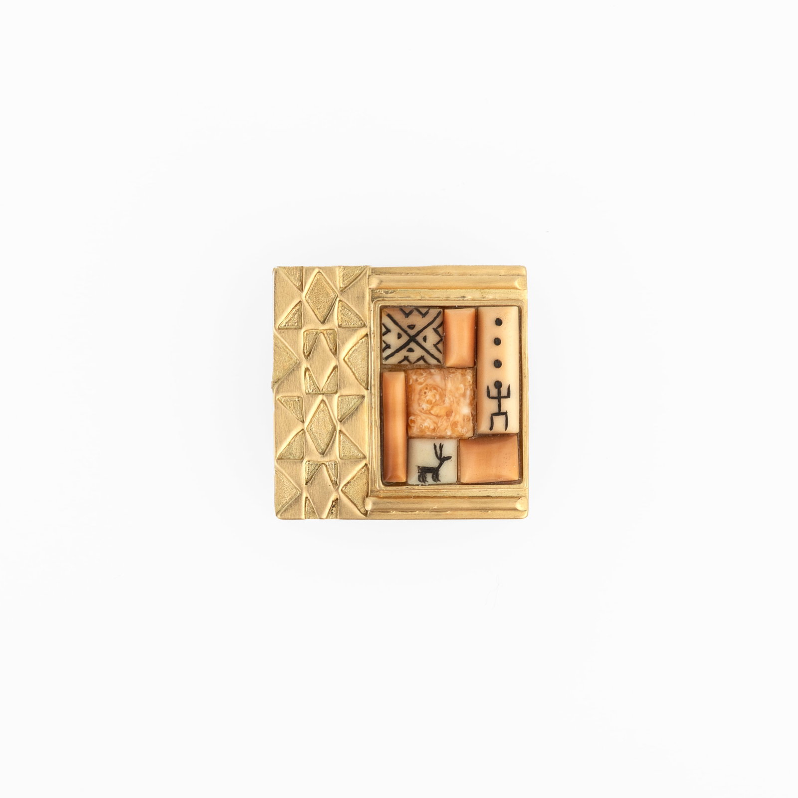 Denise Wallace, Inlaid 18k Gold Pin/Pendant, 2001: Denise Wallace Chugach-Aleut, b. 1957 Inlaid 18k Gold Pin/Pendant, 2001 18k gold, fossilized bone inscribed: ESKIMO & SIBERIAN / PATTERNS dw © 2001 18 K gross weight: 13 g. 1 x 1 in. (2.5 x 2.5 cm.)