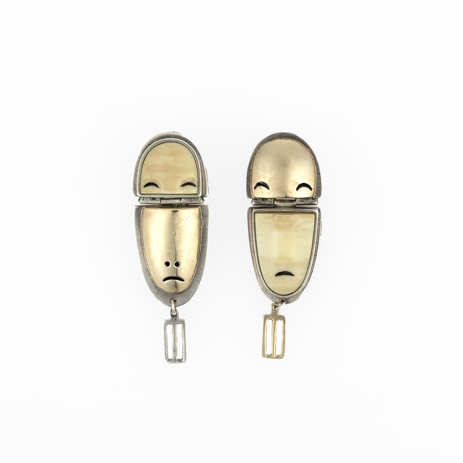 Denise Wallace, Pair of 14k Gold and Silver Earrings with Inverted Face Design, 1996: Denise Wallace Chugach-Aleut, b. 1957 Pair of 14k Gold and Silver Earrings with Inverted Face Design, 1996 sterling silver, 14k gold, fossilized bone, edition 62 of 100 inscribed: TANQIK / LIMITED