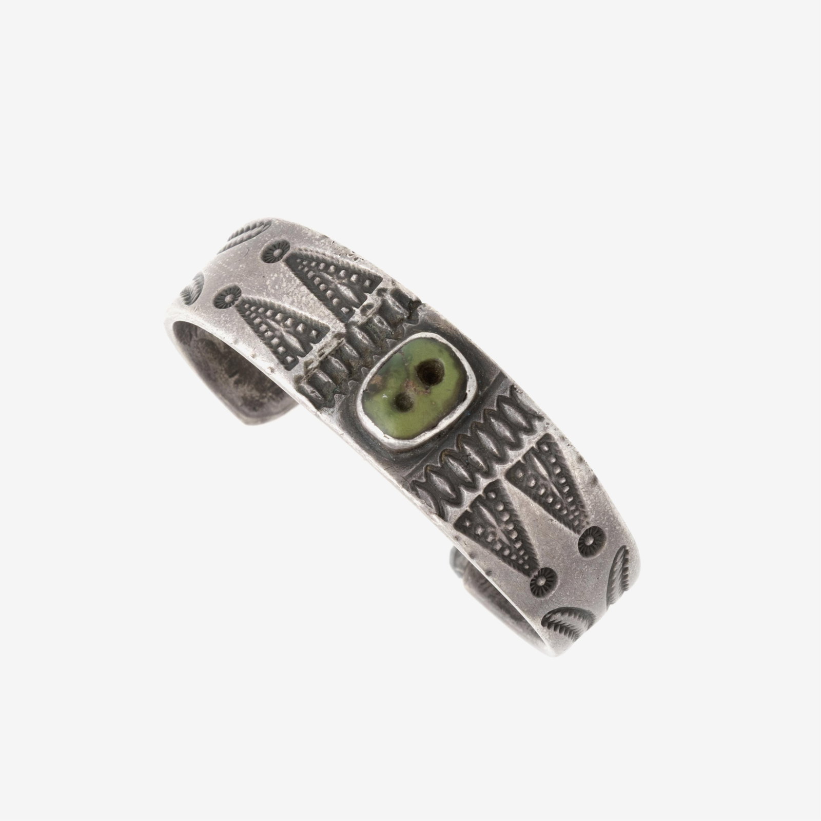 Diné (Navajo), Silver Cuff with Turquoise Cabochon, ca. 1890 - 1910: Diné (Navajo) Silver Cuff with Turquoise Cabochon, ca. 1890 - 1910 turquoise, silver from hand-wrought ingot gross weight: 46 g. inner circumference: 5 in. (12.7 cm.), gap: 1 1/8 in. (2.9 cm.), width