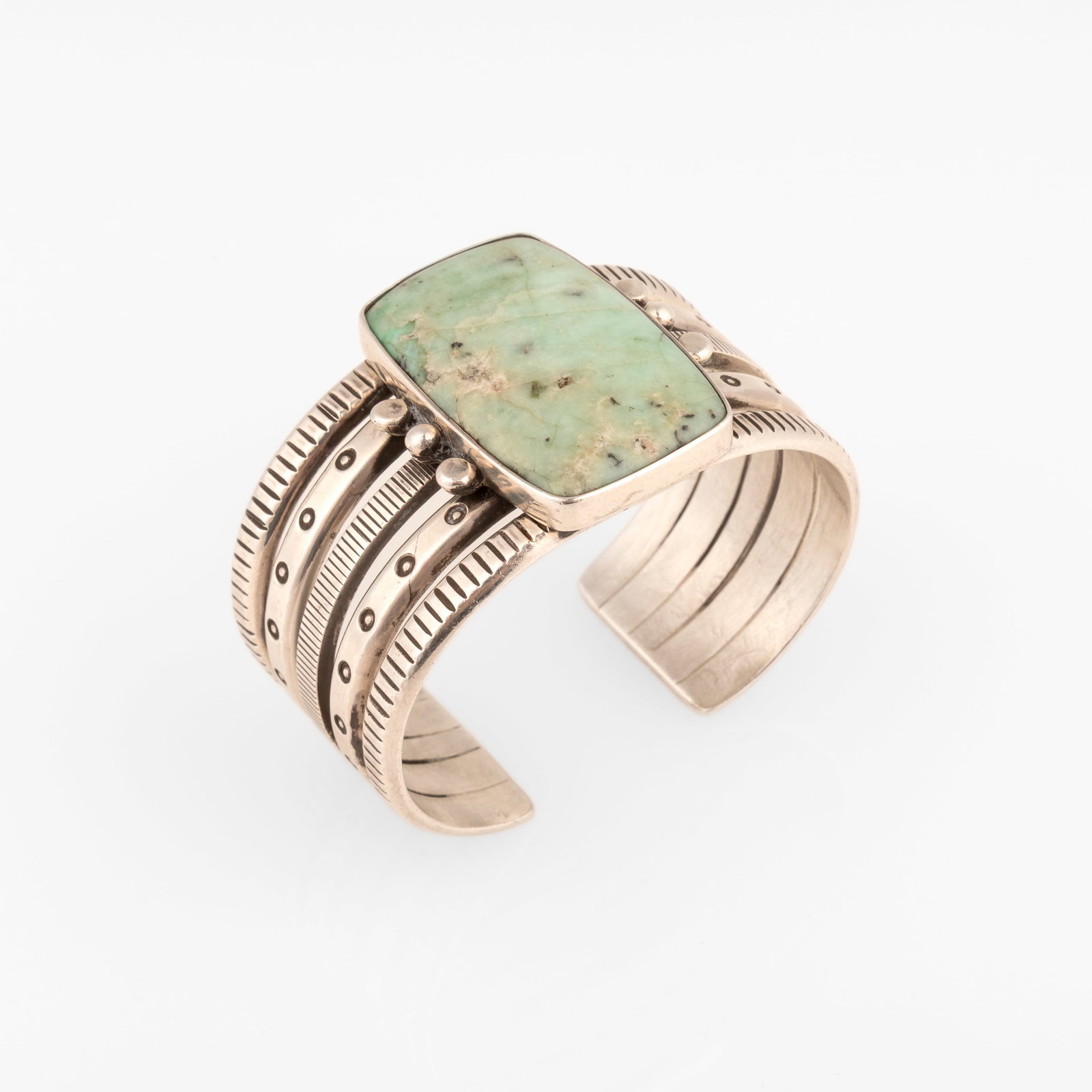 Mike Bird-Romero, Silver and Peruvian Opal Cuff: Mike Bird-Romero Ohkay Owingeh (San Juan), b. 1946 Silver and Peruvian Opal Cuff opal, sterling silver stamped: STERLING [artist's cipher] gross weight: 86 g. inner circumference: 5 3/8 in. (13.7 cm.)