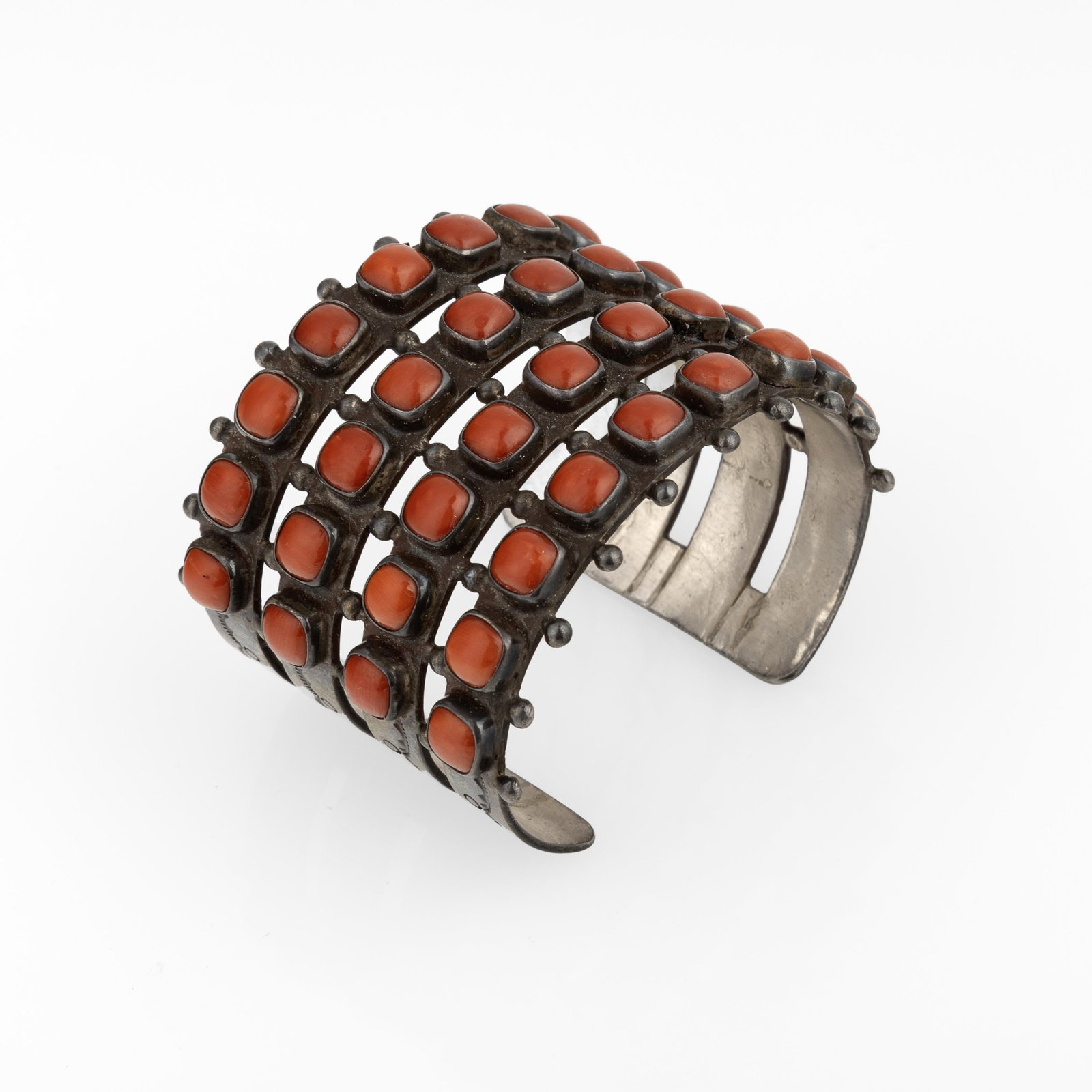 Raymond Armstrong, Four Row Coral Cuff, ca. 2000: Raymond Armstrong Diné (Navajo), 20th/21st Century Four Row Coral Cuff, ca. 2000 coral, silver stamped: RA gross weight: 84 g. inner circumference: 5 1/8 in. (13 cm.), gap: 1 in. (2.5 cm.), width: 1