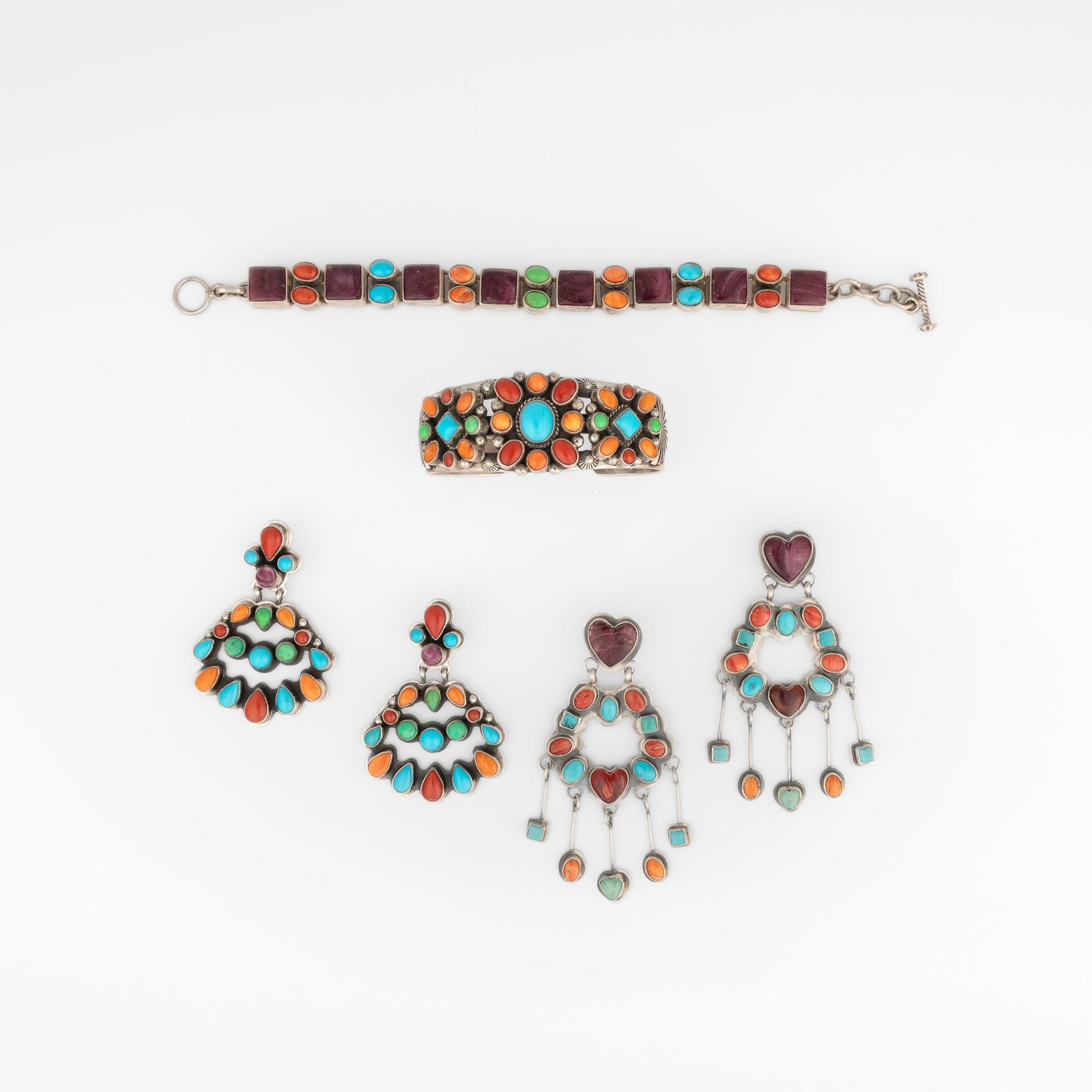 Roie Jaque et al, Suite of Mixed Stone Jewelry Items: Bracelet + Cuff + Two Pairs of Earrings: Roie Jaque et al Diné (Navajo), 20th/21st Century Suite of Mixed Stone Jewelry Items: Bracelet + Cuff + Two Pairs of Earrings sterling silver, chrysophrase, spiny oyster, turquoise, coral Roie Jaque 