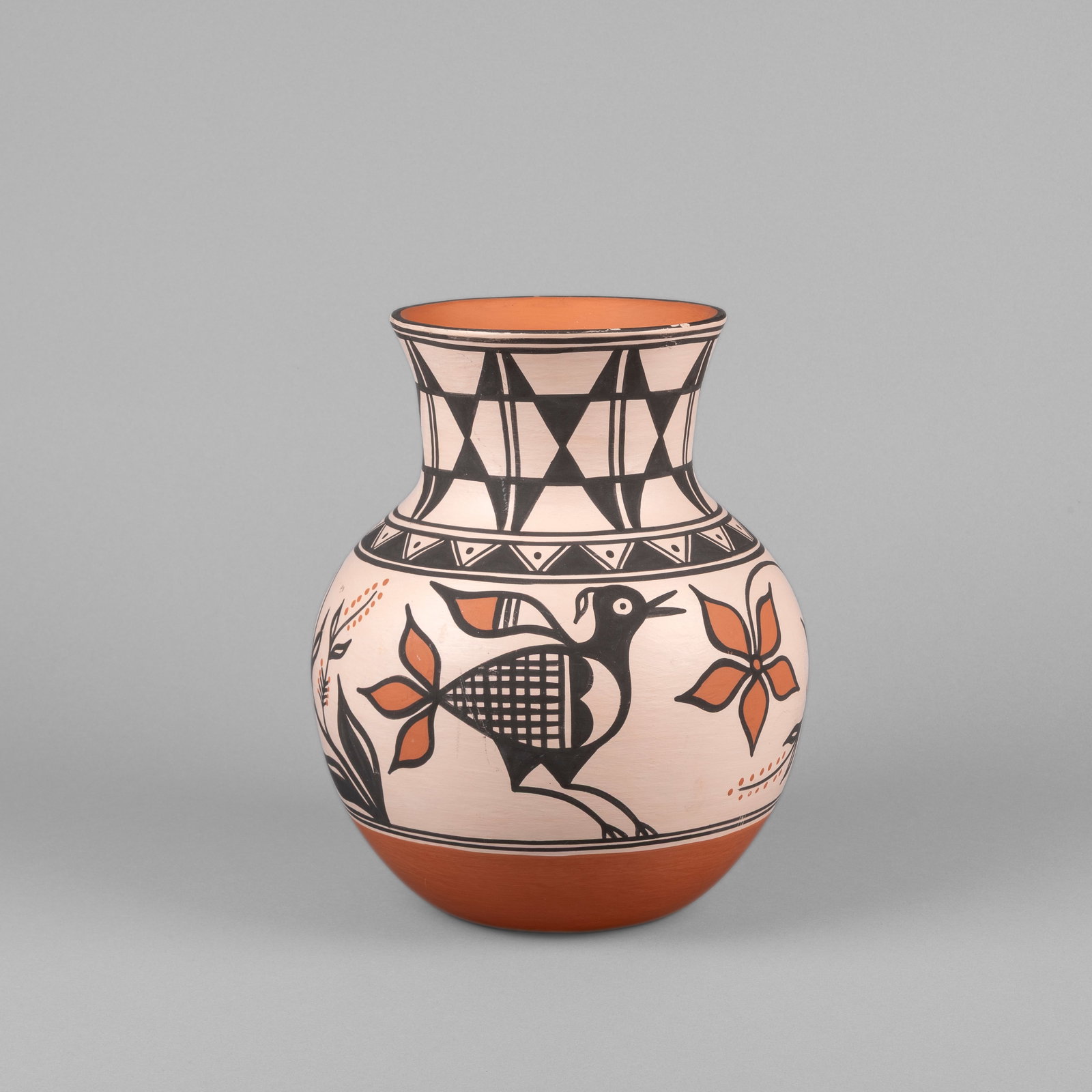 Thomas Tenorio, Polychrome Vase: Thomas Tenorio Kewa (Santo Domingo), b. 1963 Polychrome Vase fired clay inscribed: ThomMAS Tenorio / Santo Domingo Pueblo, / N.M. height: 11 x diameter: 8 1/2 in. (27.9 x 21.6 cm.) Private Collection