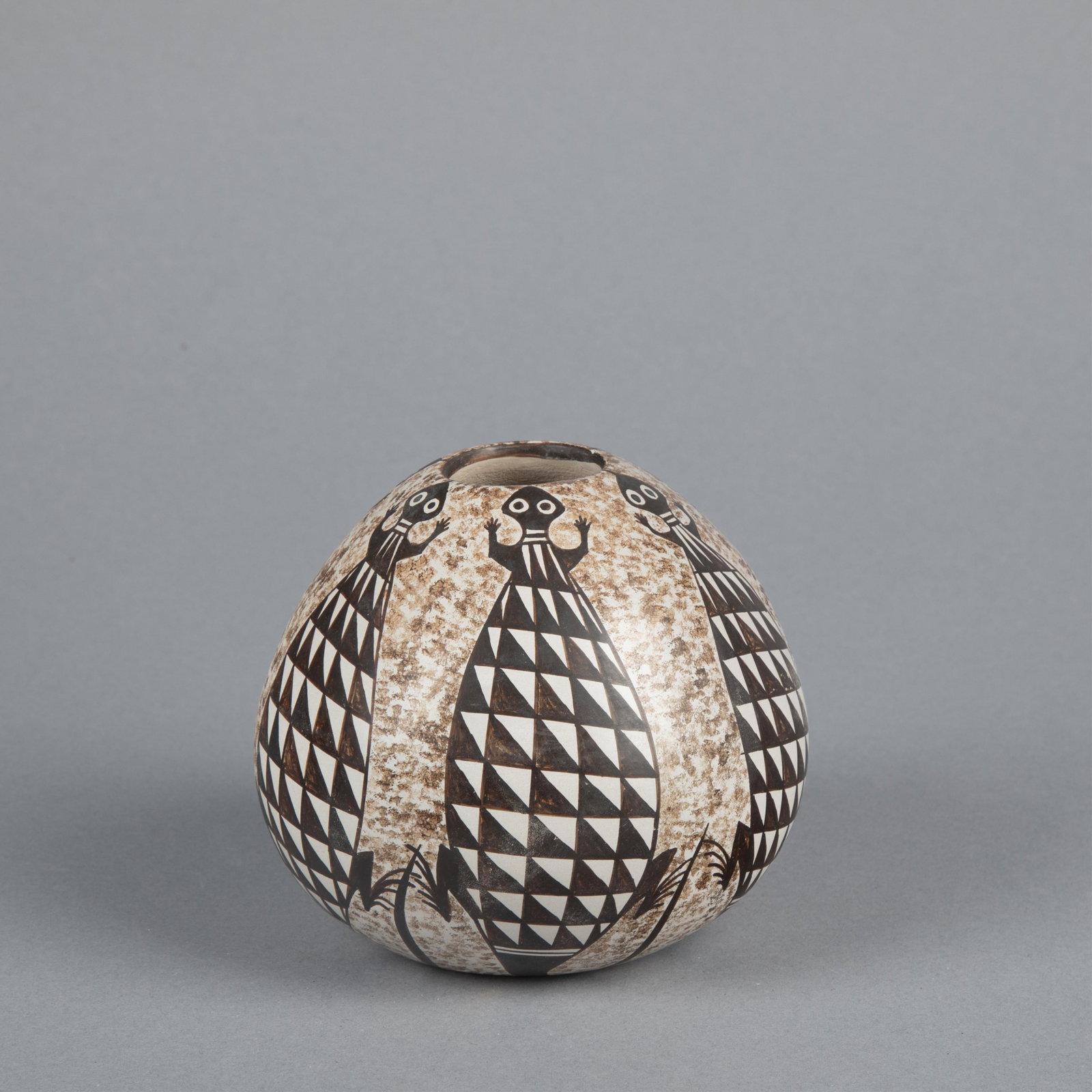 Sylvia [Feather Woman] Naha, Pot with Lizard Designs: Sylvia [Feather Woman] Naha Hopi-Tewa, 1951 - 1999 Pot with Lizard Designs fired clay inscribed: [Feather Woman cipher] S height: 4 1/4 x diameter: 5 in. (10.8 x 12.7 cm.) Private Collection, Califor