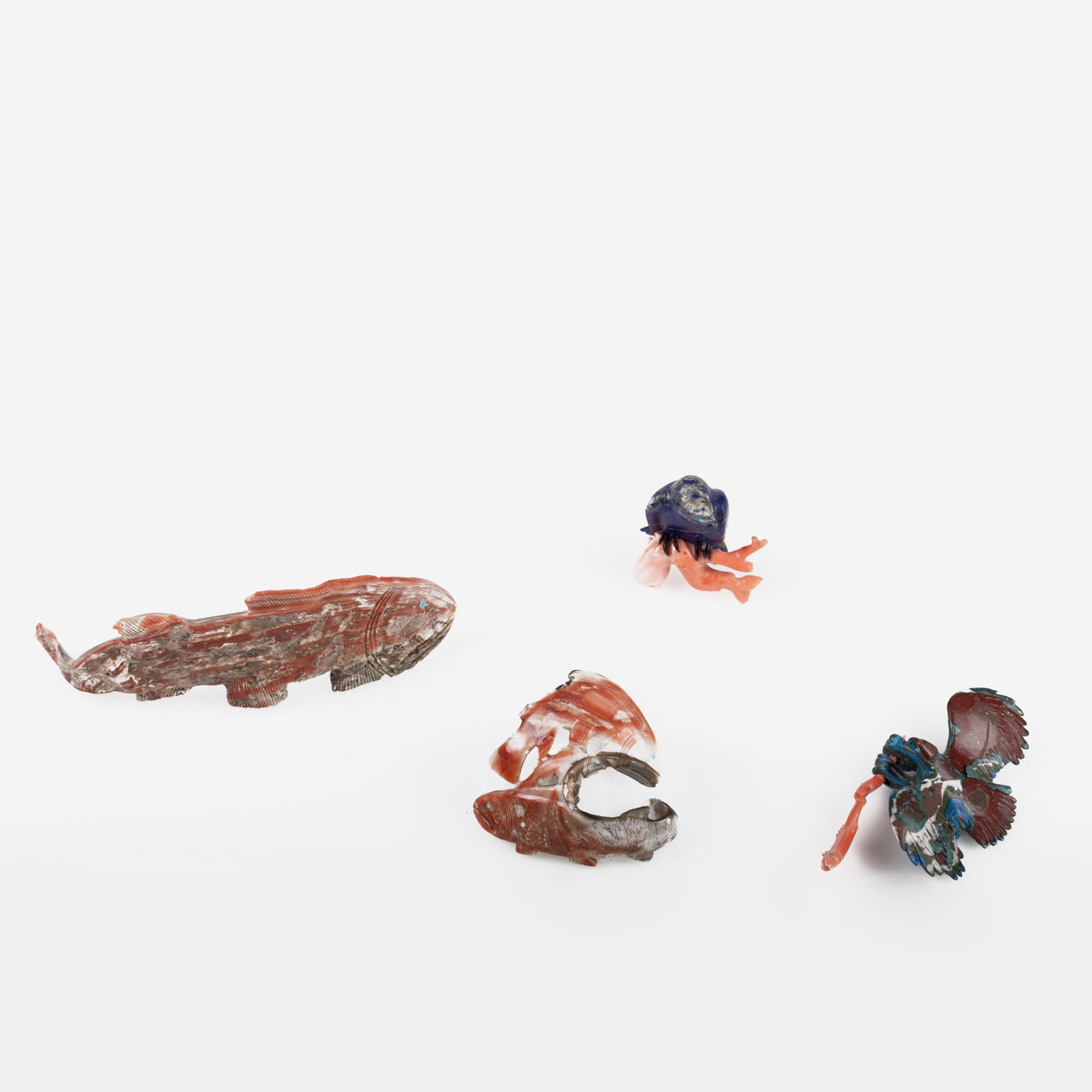Zuni, Group of Four Fetishes: Zuni Group of Four Fetishes carved shell, carved stone smallest: 3 x 2 1/2 x 1 1/2 in. (7.6 x 6.4 x 3.8 cm.), largest: 2 3/4 x 7 1/2 x 1 in. (7 x 19.1 x 2.5 cm.) Private Collection, New Mexico