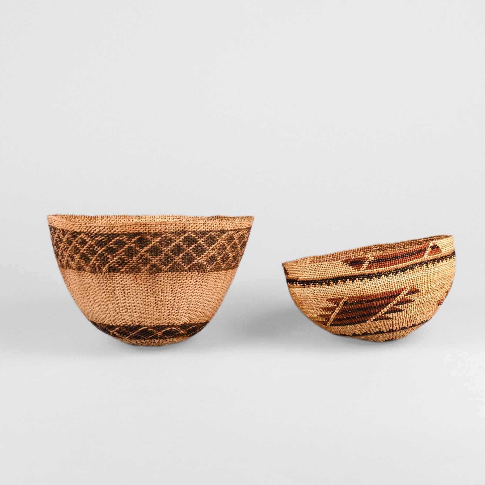 Karuk + Paiute, Two Basketry Works: Hat + Bowl: Karuk + Paiute Two Basketry Works: Hat + Bowl natural fibers Karuk Twined Basketry Hat height: 4 1/4 x diameter: 7 in. (10.8 x 17.8 cm.) Paiute Great Basin Area Basket height: 6 in. (15.2 cm.),