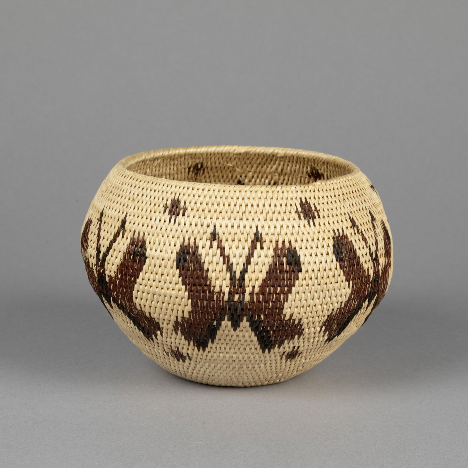 Washoe, Pictorial Degikup Basket with Butterfly Design: Washoe Pictorial Degikup Basket with Butterfly Design natural fibers height: 5 in. (12.7 cm.), diameter: 7 in. (17.8 cm.) Private Collection, California