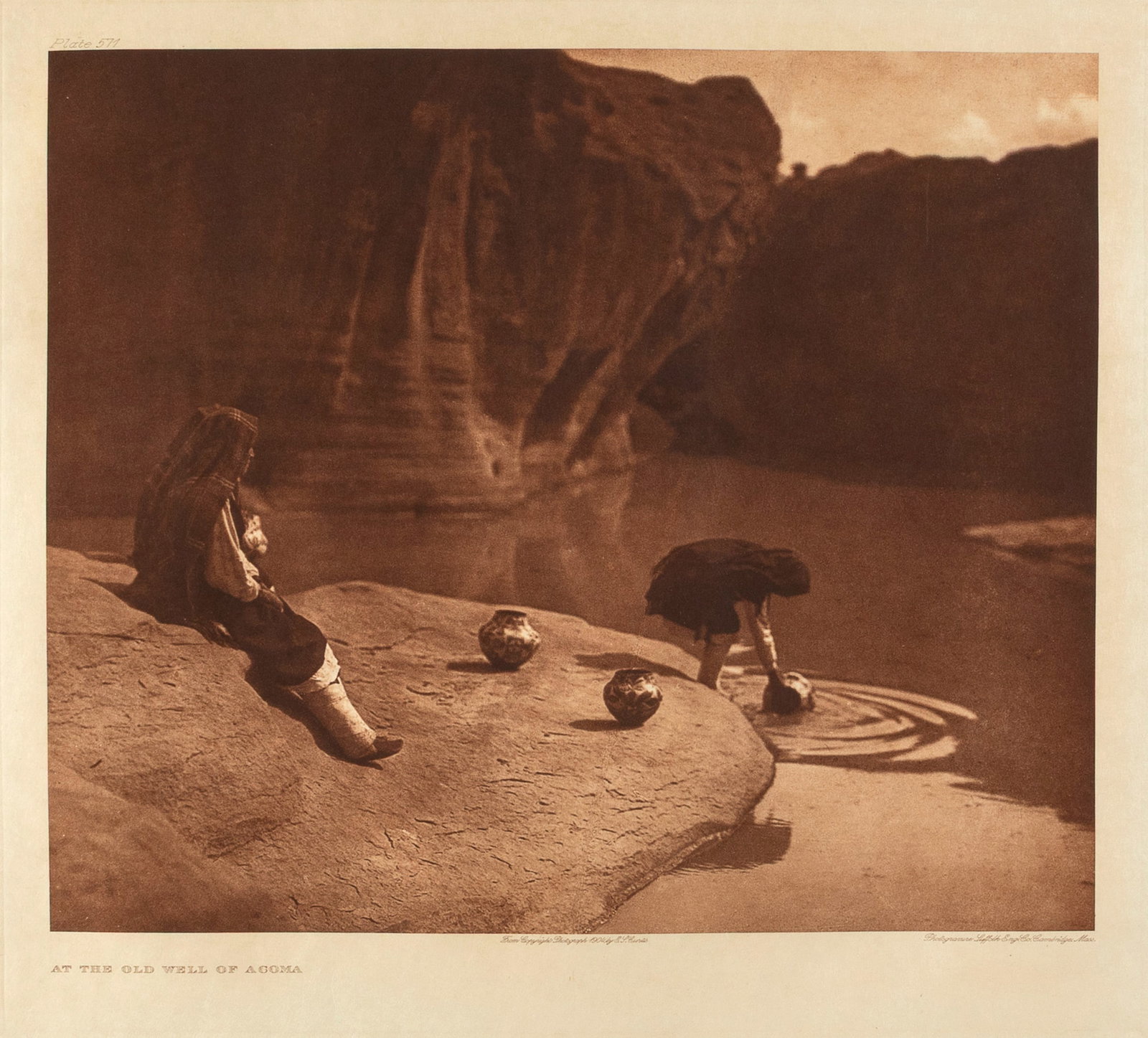Edward S. Curtis, At the Old Well of Acoma, 1904: Edward S. Curtis 1868 - 1952 At the Old Well of Acoma, 1904 photogravure on Japanese vellum inscribed in plate, upper left: Plate 571 titled in plate, lower left: AT THE OLD WELL OF ACOMA inscribed in