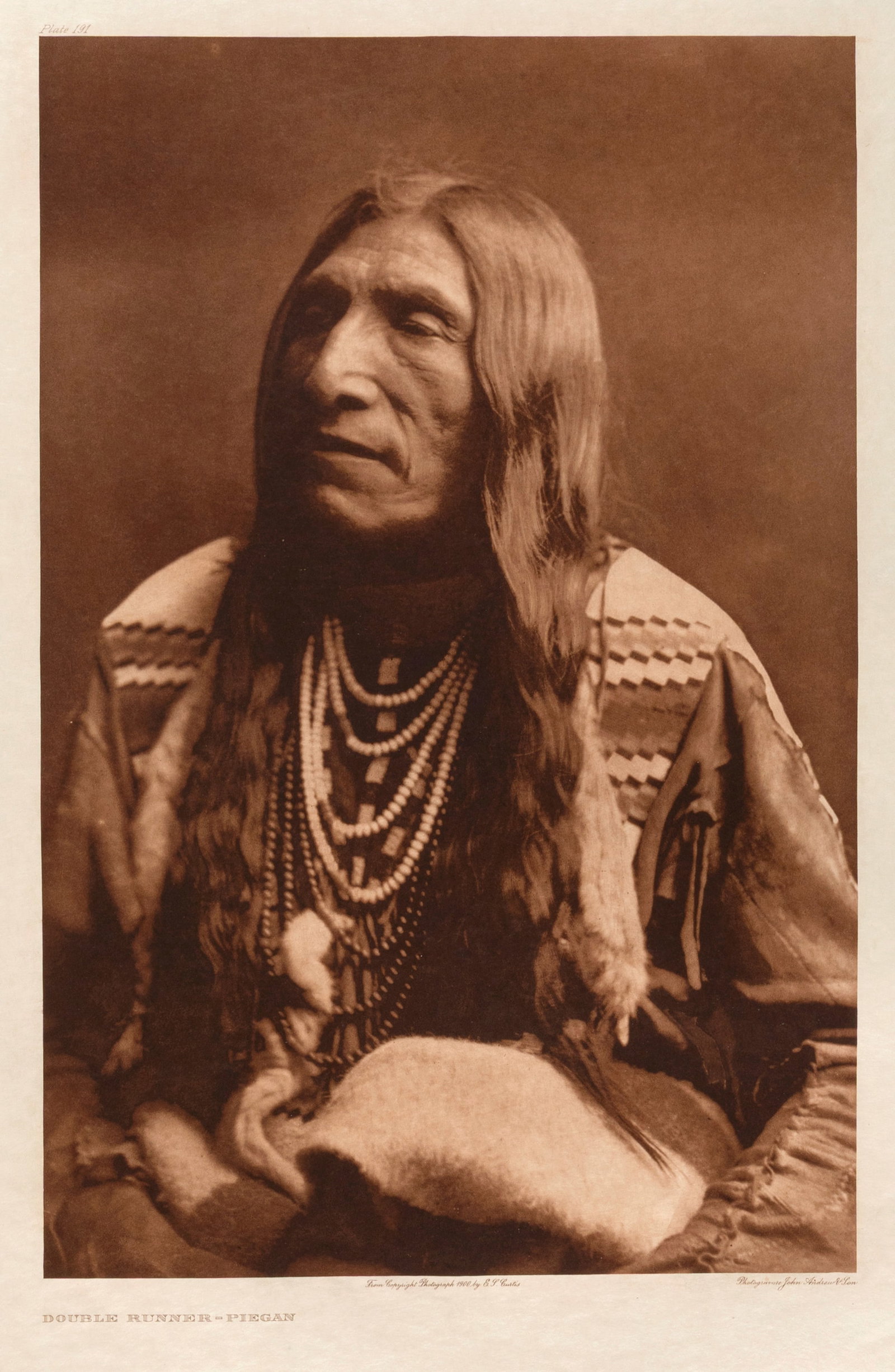 Edward S. Curtis, Double Runner - Piegan, 1911: Edward S. Curtis 1868 - 1952 Double Runner - Piegan, 1911 photogravure on Japanese vellum inscribed in plate, upper left: Plate 191 titled in plate, lower left: DOUBLE RUNNER - PIEGAN inscribed in pla