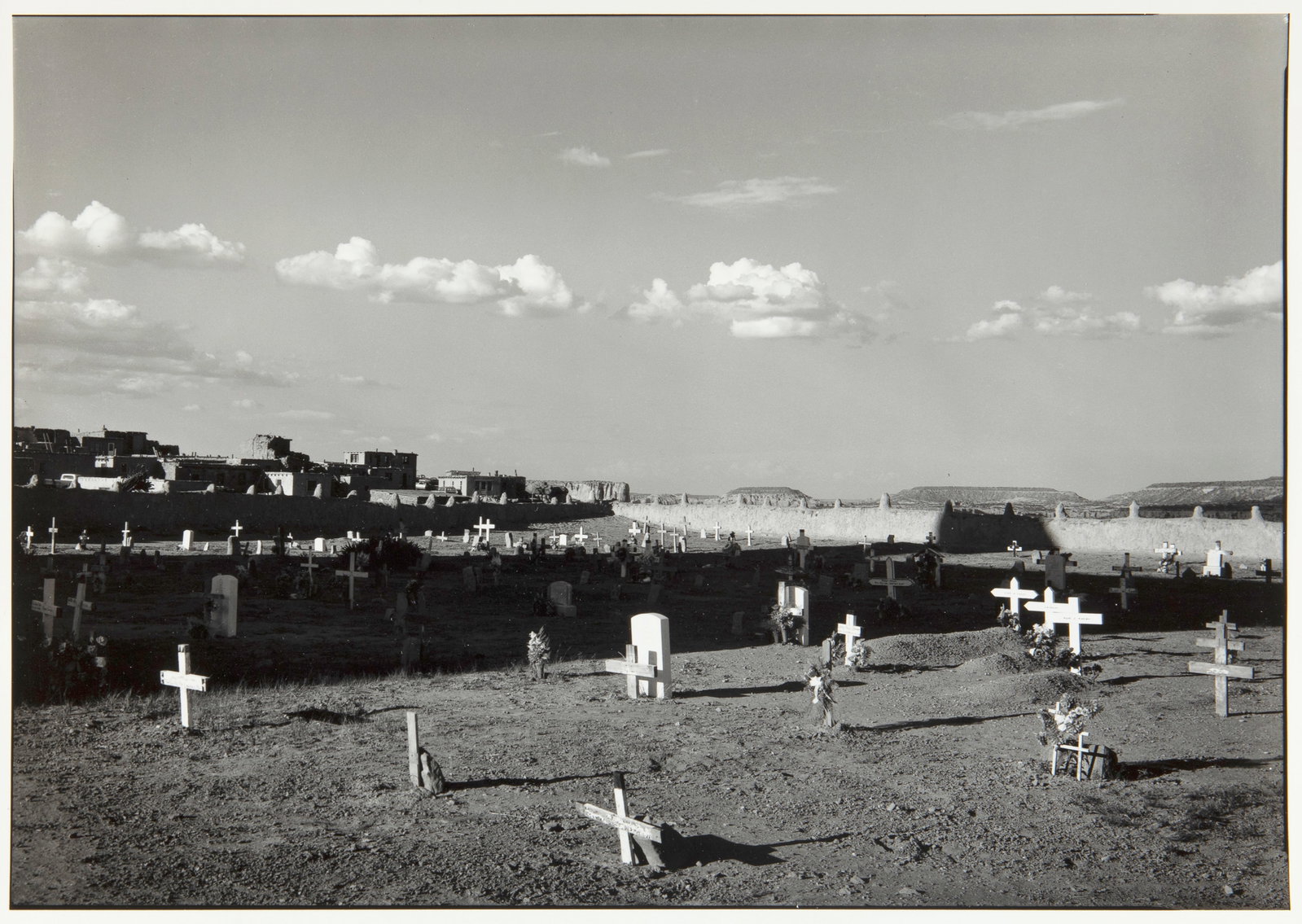 Paul Caponigro, Graveyard, Acoma Pueblo, New Mexico, ca. 1976: Paul Caponigro 1932 - 2024 Graveyard, Acoma Pueblo, New Mexico, ca. 1976 gelatin silver inscribed verso: Graveyard, Acoma Pueblo, New Mexico ca. 1976 9 1/2 x 13 1/2 in. (24.1 x 34.3 cm.), sheet: 10 7/