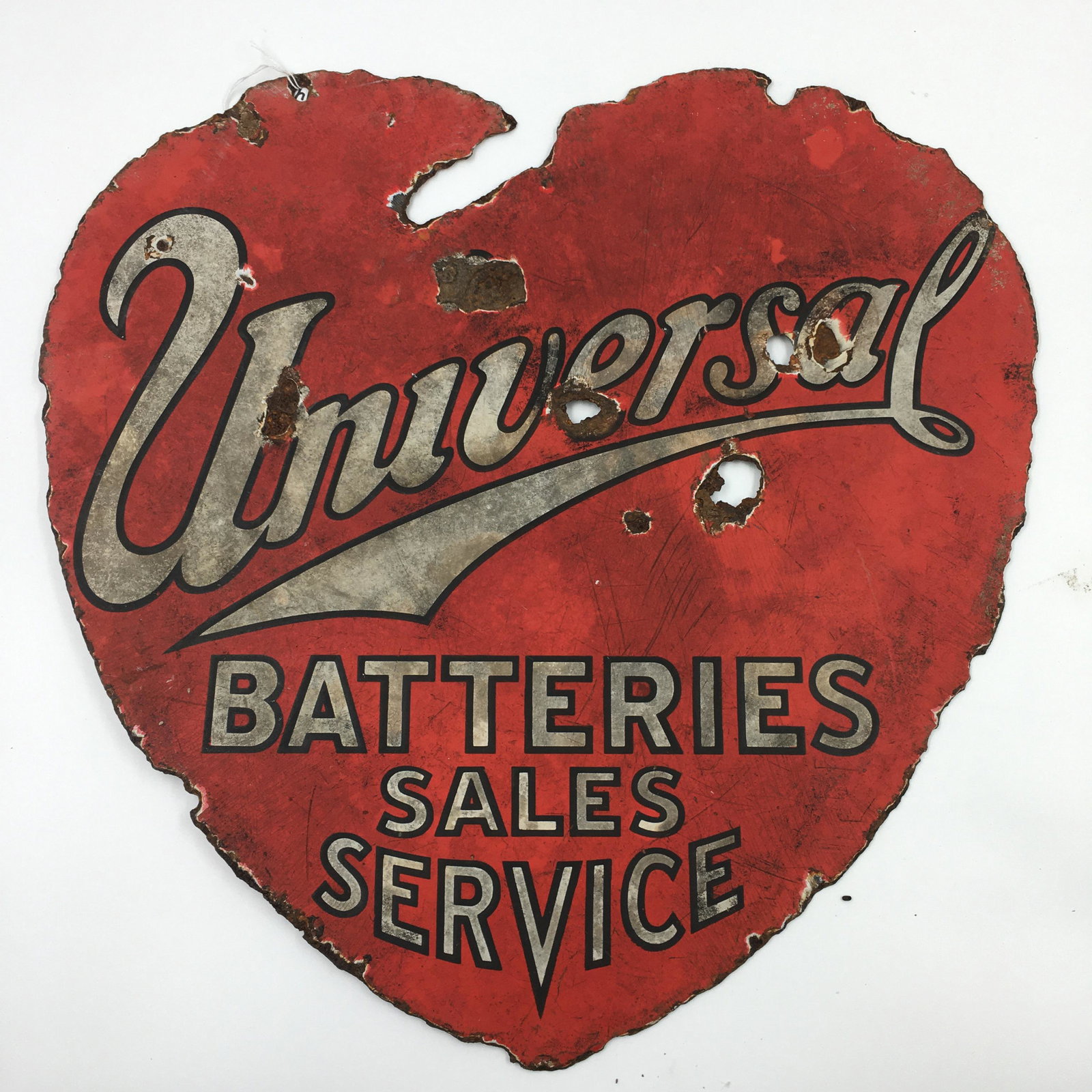 Universal Batteries Sales Service Heart-Shaped Sign (1 of 2)