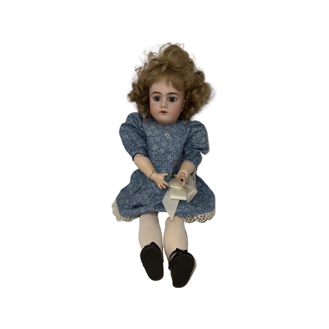 German Bisque Doll by Handwerck: German Bisque by Handwerck, 21" doll with synthetic wig and vintage clothing. Eyes are set, body marked Handwerck. Missing 3 fingers