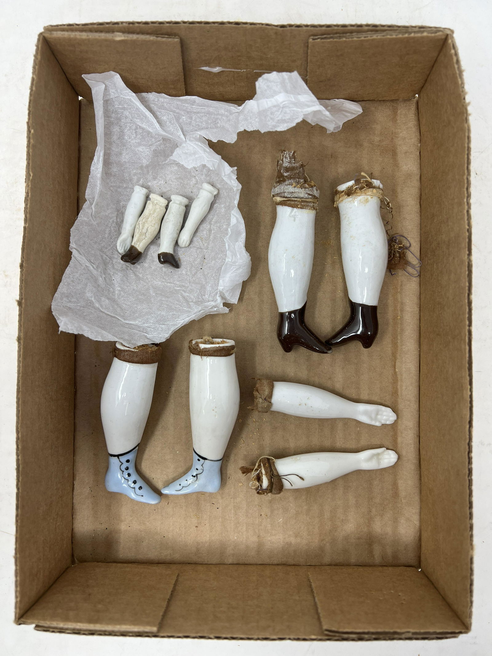 Antique China Doll Parts: Antique China Doll Parts. One set of small bisque arms & legs, 1.5"L, 2 sets of china legs & 1 set of china arms, largest is 3"L