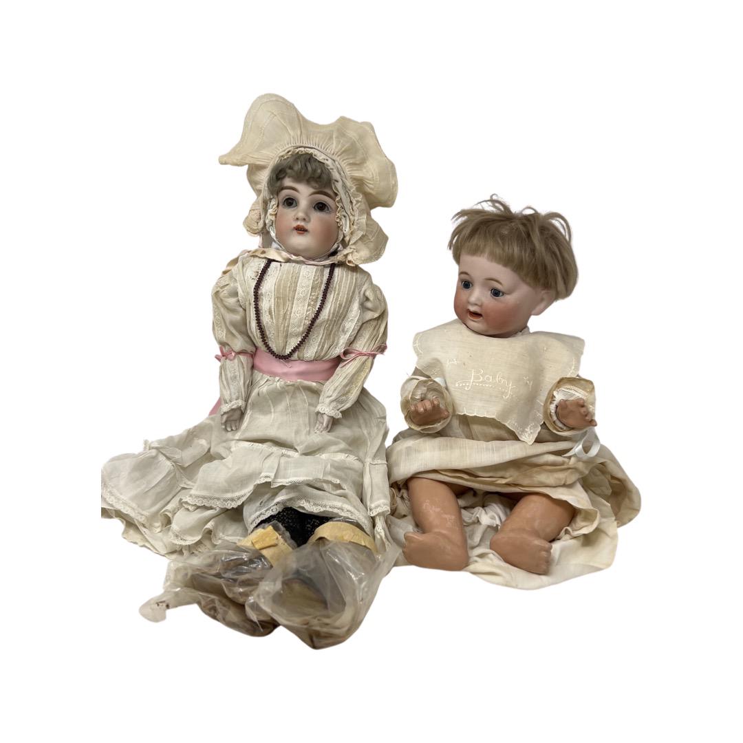 Lot of (2) German Bisque Head Dolls: Lot of (2) German Bisque Head Dolls. Baby is 17", sleep eyes, original wig, marked MB Japan (Morimura Bros), original body, antique baby clothing. Other doll is Kestner, feet are almost detached, dete