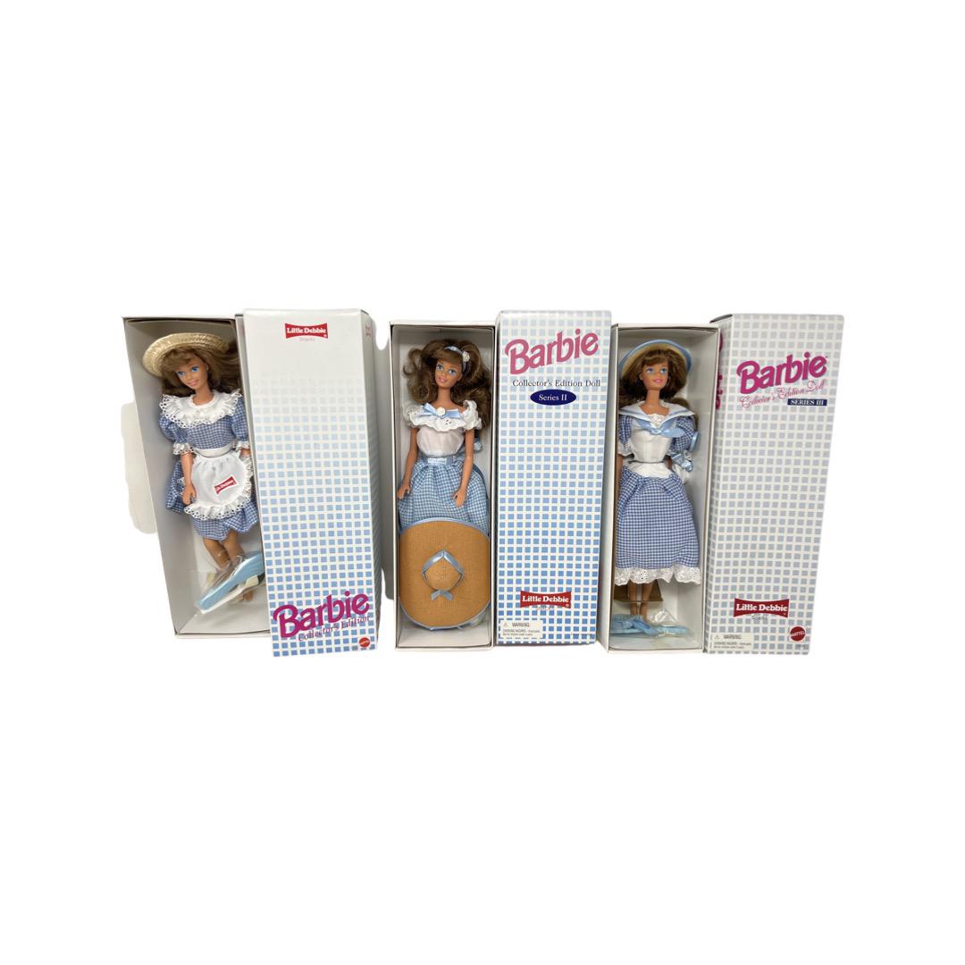 (3) Little Debbie Barbie Dolls & Dynasty Doll Little Debbie: (3) Little Debbie Collector Barbie Dolls, includes Series 1, 1992; Series II, 1995; Series III, 1997. All new in boxes. Also includes Dynasty Doll Little Debbie, 1990, new in box.