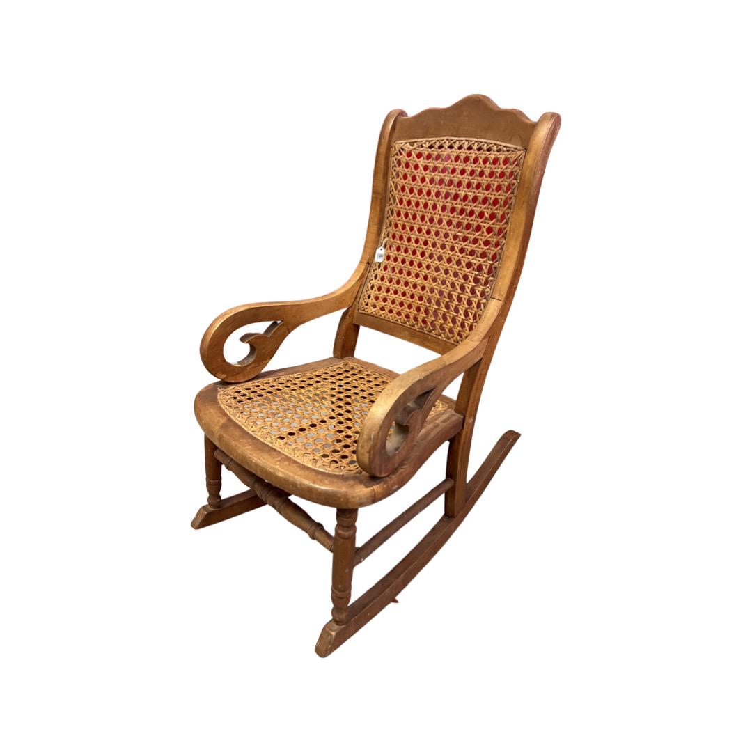 Child's Caned Rocking Chair: Child's Caned Rocking Chair. Caned back & seat both good. 26"H.