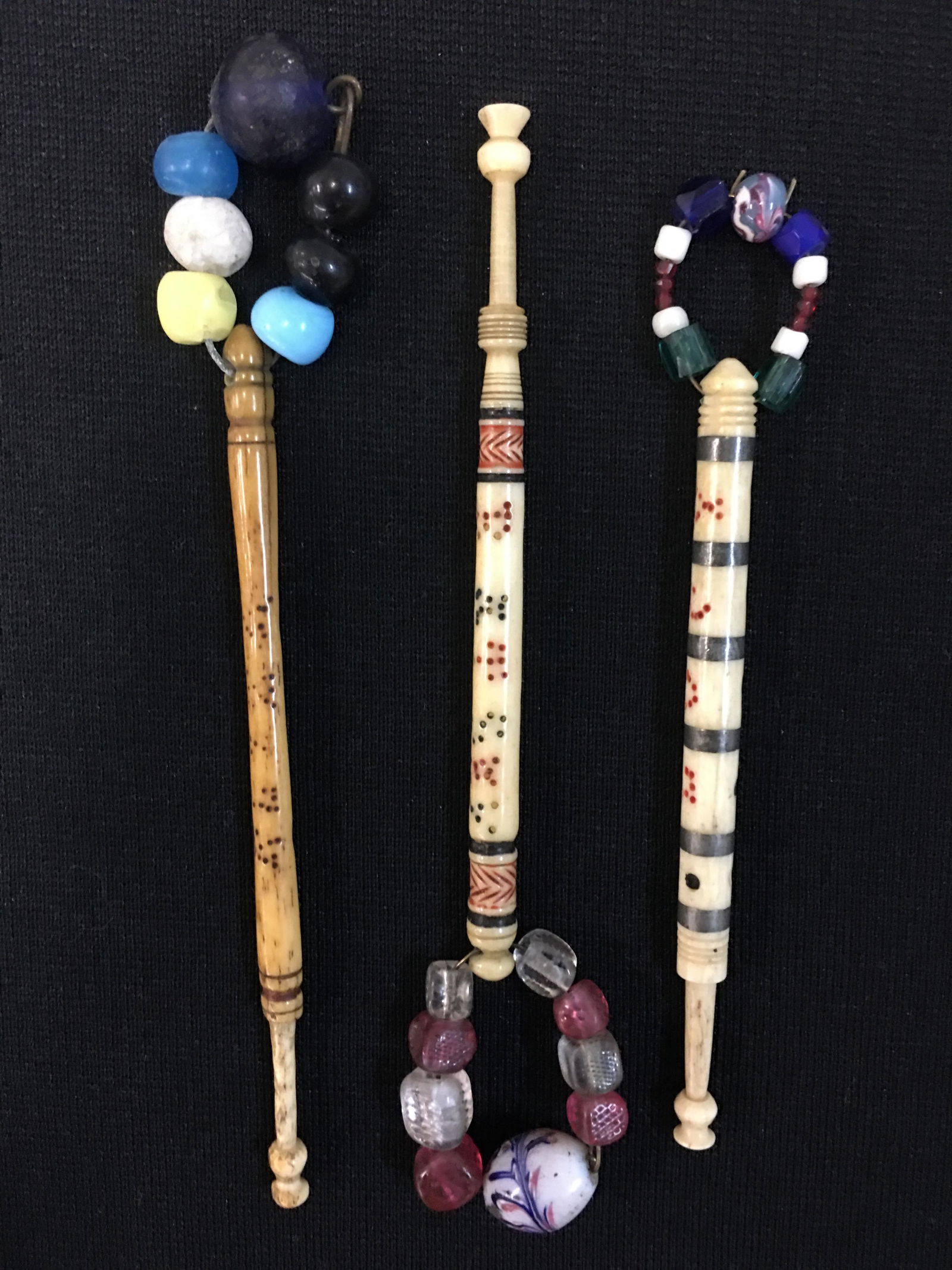 (3) Antique Bone Name Bobbins: (3) English Midland Antique Bone Name Bobbins, all spangled, spotted colored names "Lucy", "Betsey", and "Eliza". Lucy also has pewter rings.3.5"-4"