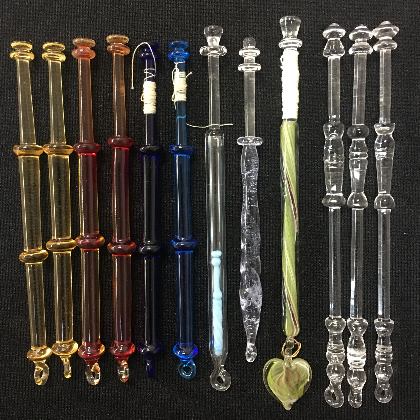(12) Glass Lace Making Bobbins: (12) Glass Lace Making Bobbins. Colored & clear glass. 3.75"-4.5"