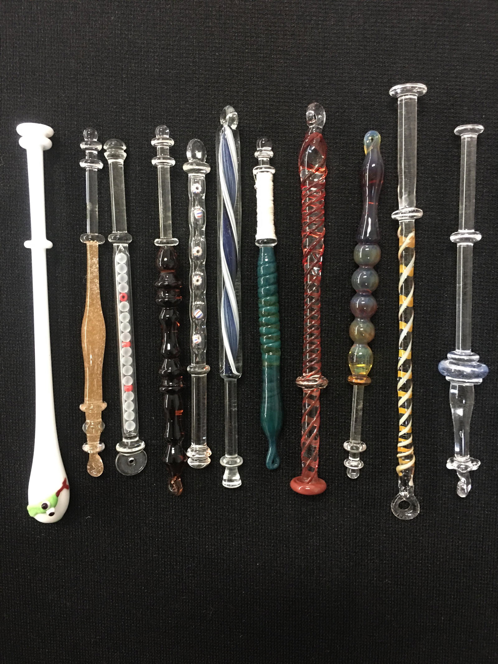 (11) Glass Lace Making Bobbins: (11) Glass Lace Making Bobbins. Colored & clear glass. 3.75"-4.5"