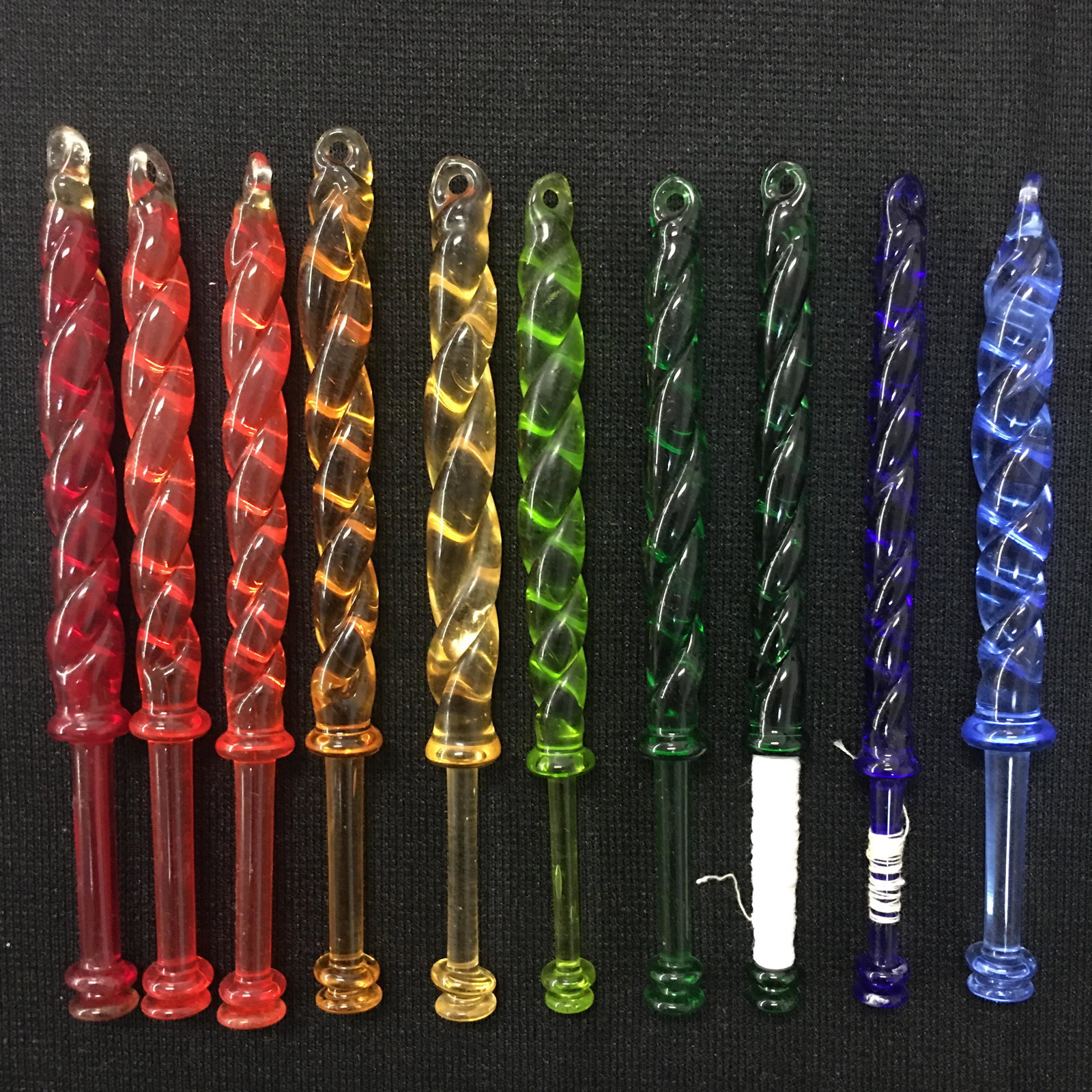 (10) Glass Lace Making Bobbins: (10) Glass Lace Making Bobbins. Set of (10) colored glass bobbins in same design with varying diameters. 3.875"-4.125"