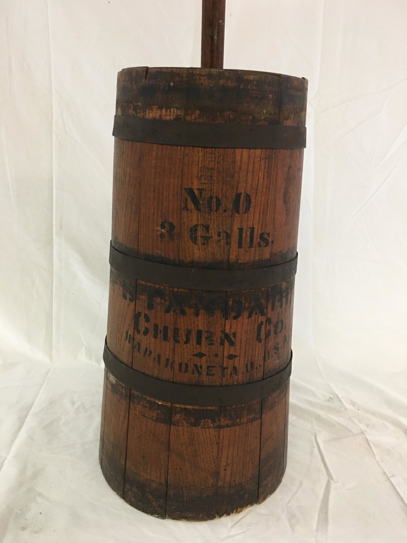Standard Churn Co. Banded Stave Floor Churn: Standard Churn Co. Banded Stave Floor Churn. Stenciled No. 0 3 Gallon Standard Churn Co, Wapakoneta, O, USA. Missing Bottom Band. 8"W x 43.5"H