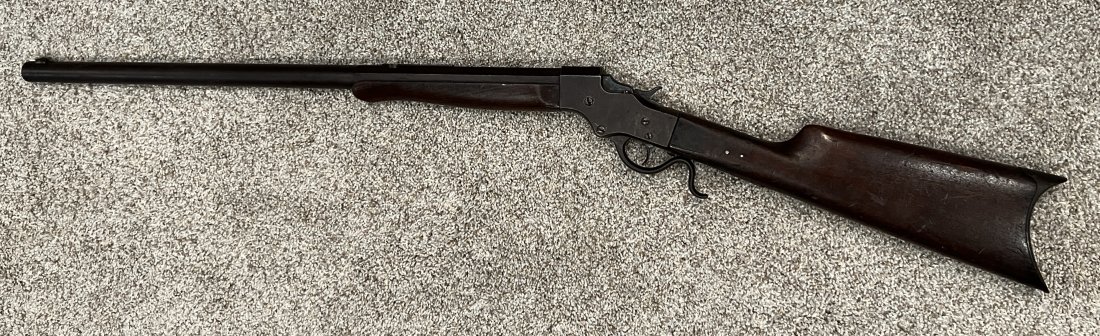 J Stevens A&T Co. .32 Long Rifle: J Stevens A&T Co. .32 Long Rifle, heavy 22-inch barrel, has a crack in the butt stock near the rear tang. Serial # 16367