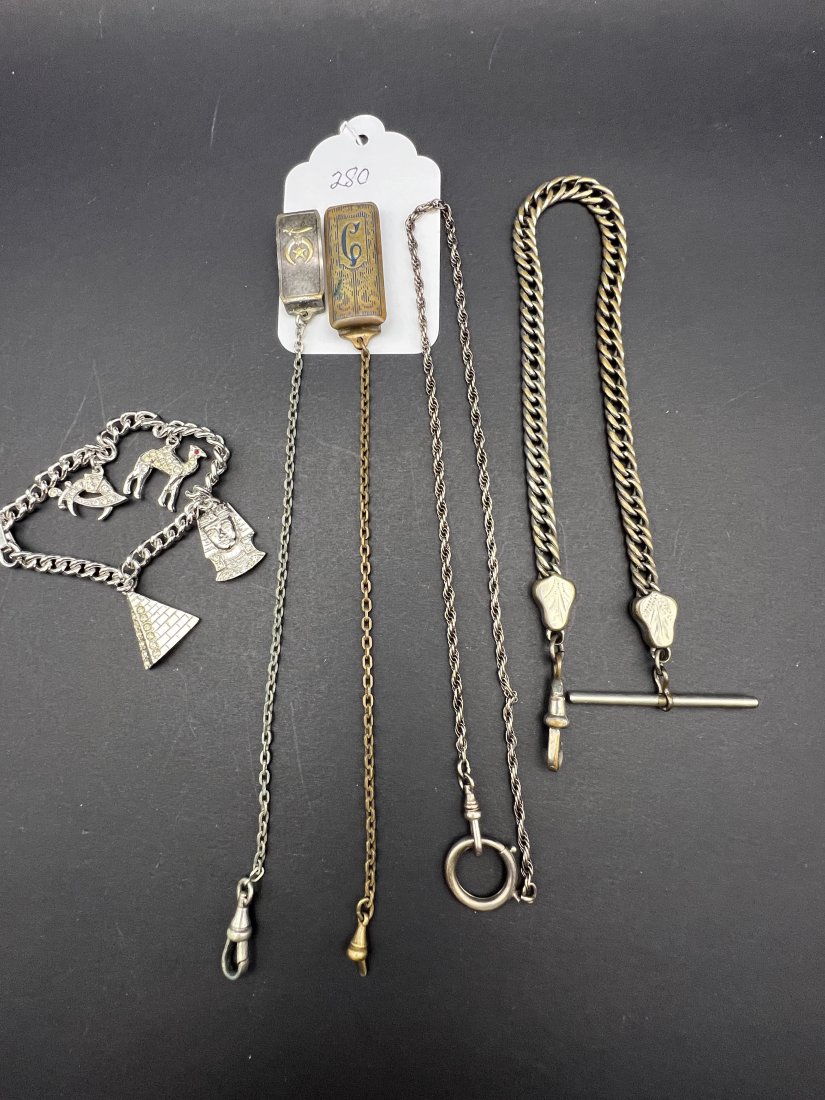 Group of 4 Watch Chains: Group of 4 Watch Chains: 2 Hitchcock w/ 1 Bronze belt clip & other is Imperial Council 1923 lodge belt clip, one lodge bracelet.