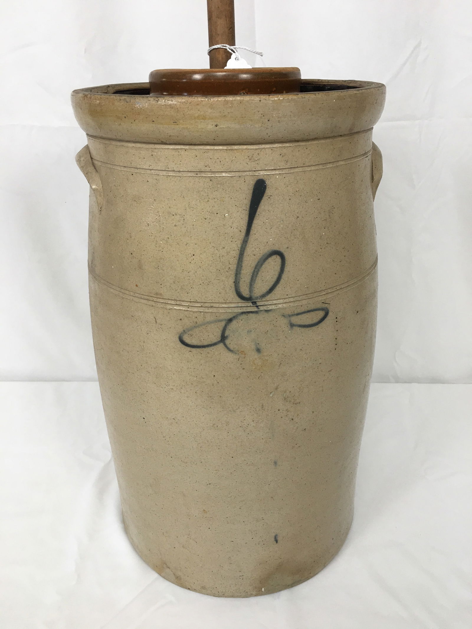 Stoneware Churn, 6 Gallon Beesting: Stoneware Churn, 6 Gallon Beesting, With Stoneware Lid. Rim chip to churn, lid in excellent condition. 36.5"H to top of dasher.