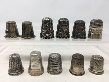 (11) Sterling Thimbles