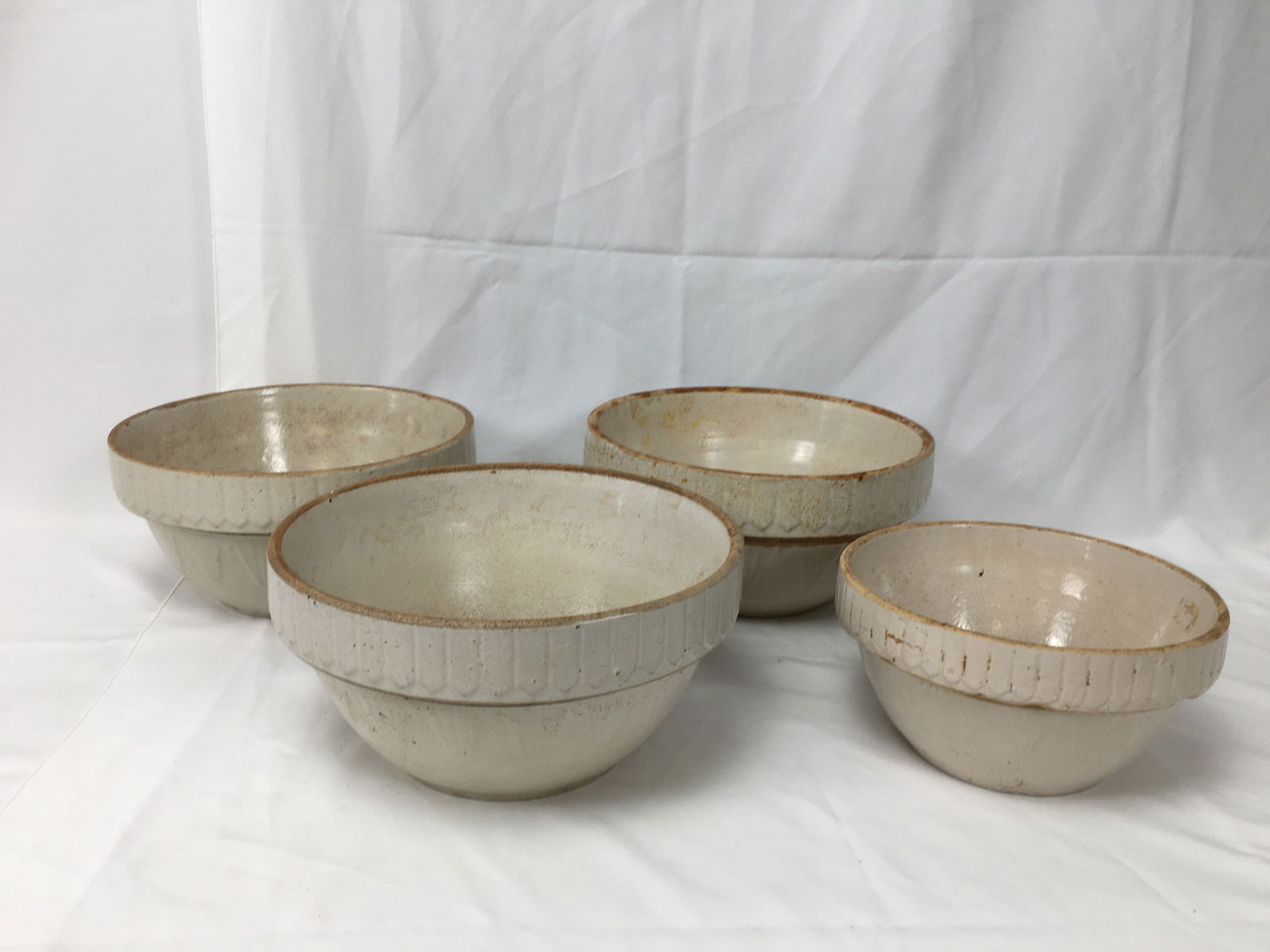 (4) Stoneware Bowls: (4) Stoneware Bowls. Picket fence pattern. Larger 10"W x 5"H