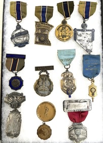 Eleven American Legion National Convention Badges