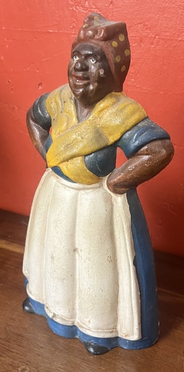 Black Americana Cast Iron Door Stop: Black Americana Cast Iron Door Stop mammy in blue dress, yellow shawl, white apron, and red & yellow polka dot bonnet.